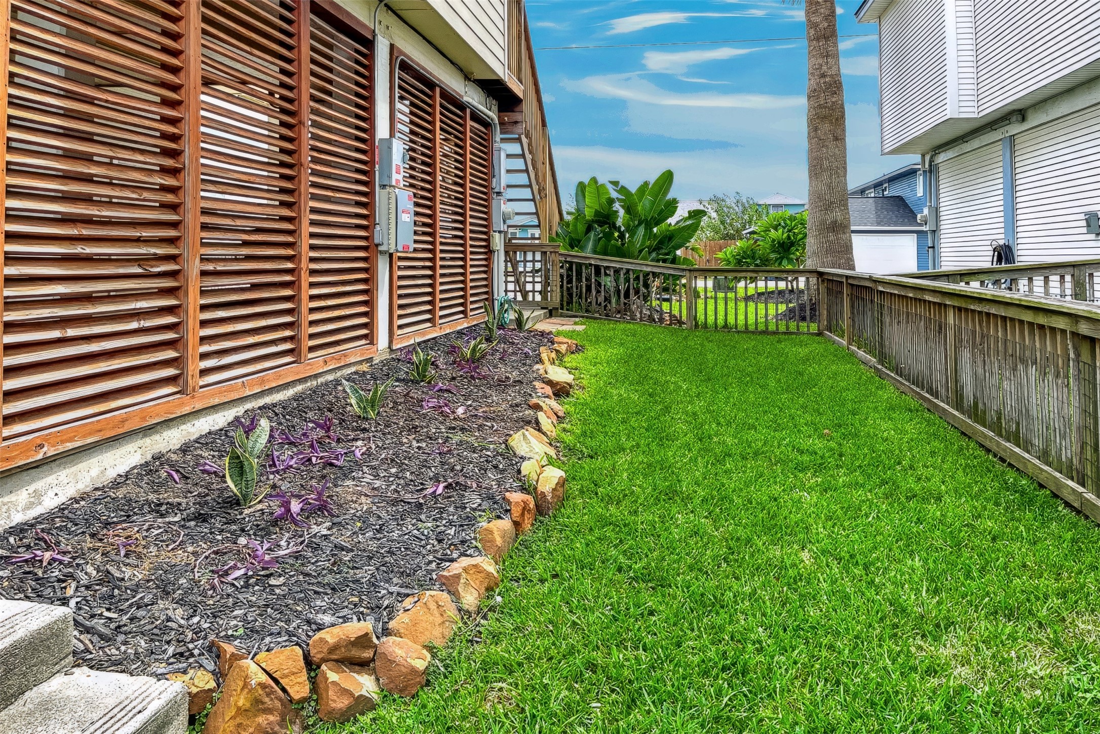 MORE AREA OF FENCED IN BACK YARD