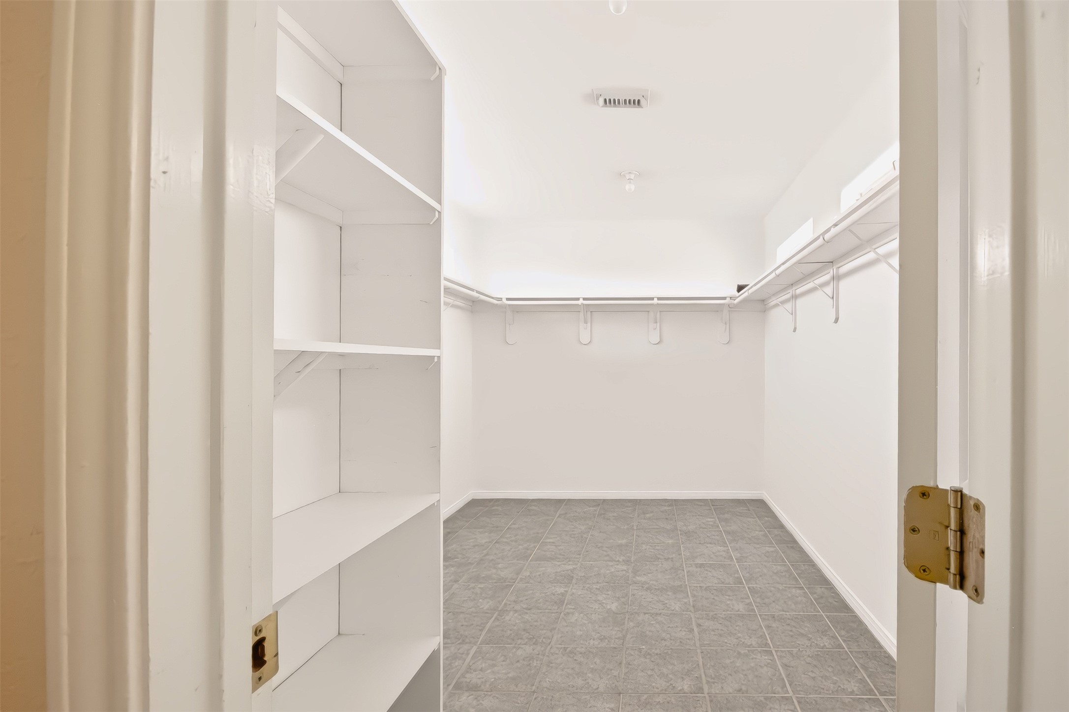 PRIMARY BEDROOM CLOSET