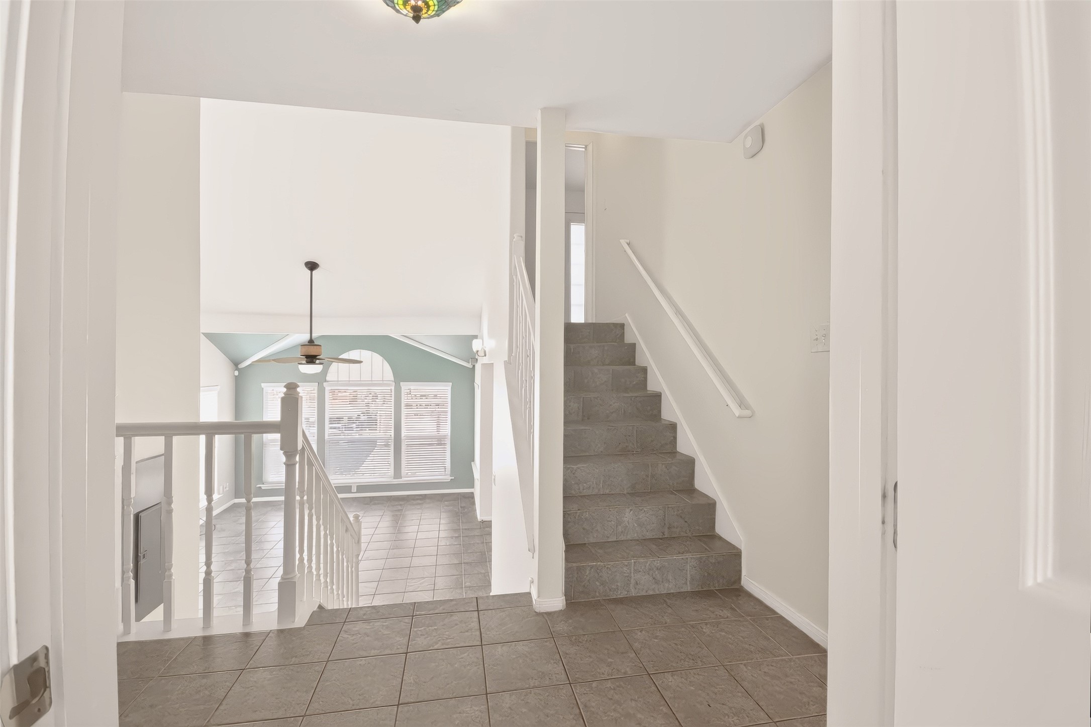 STAIRS GOING TO PRIVATE PRIMARY BEDROOM