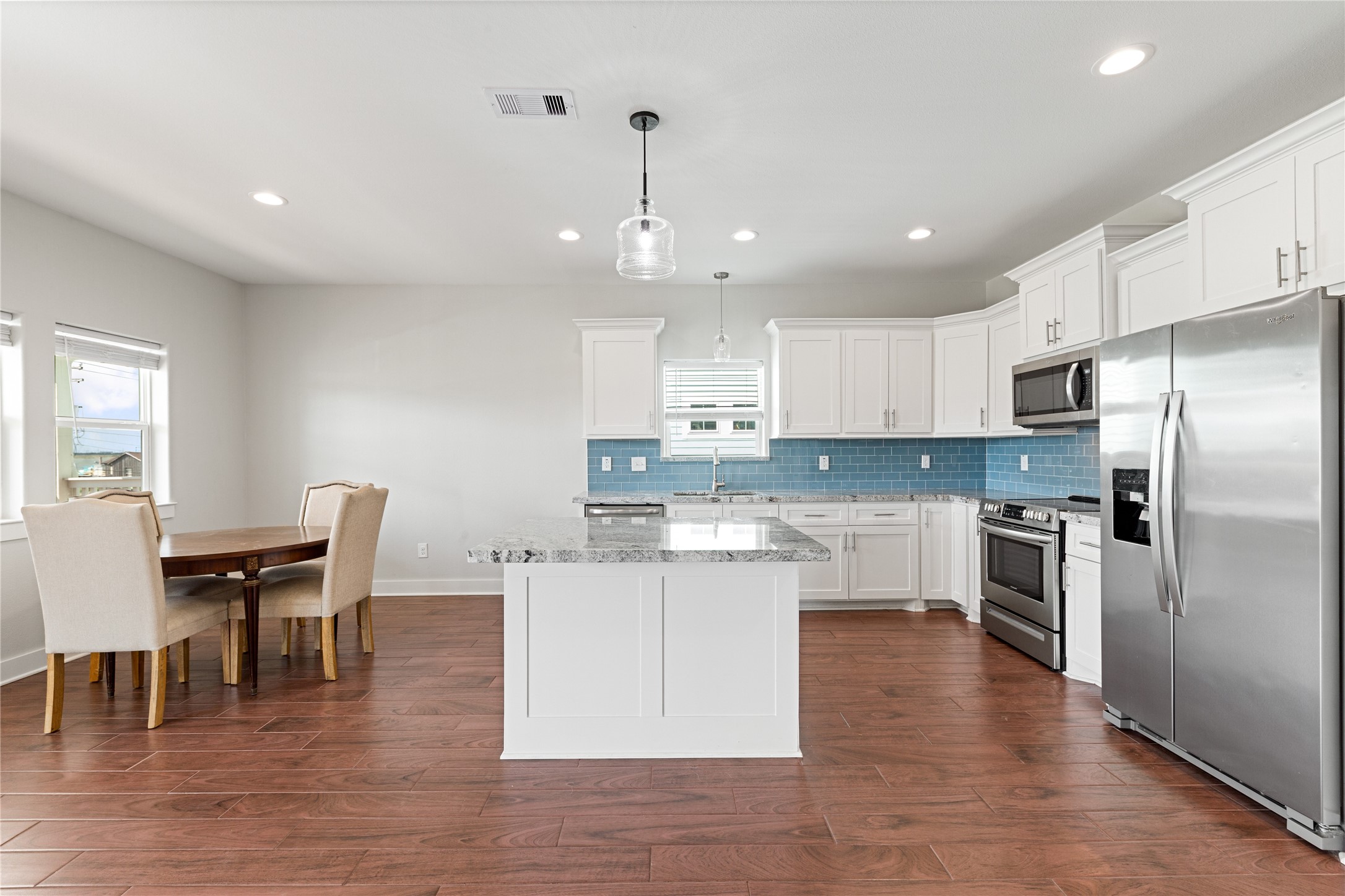 Open concept living, dining, & kitchen