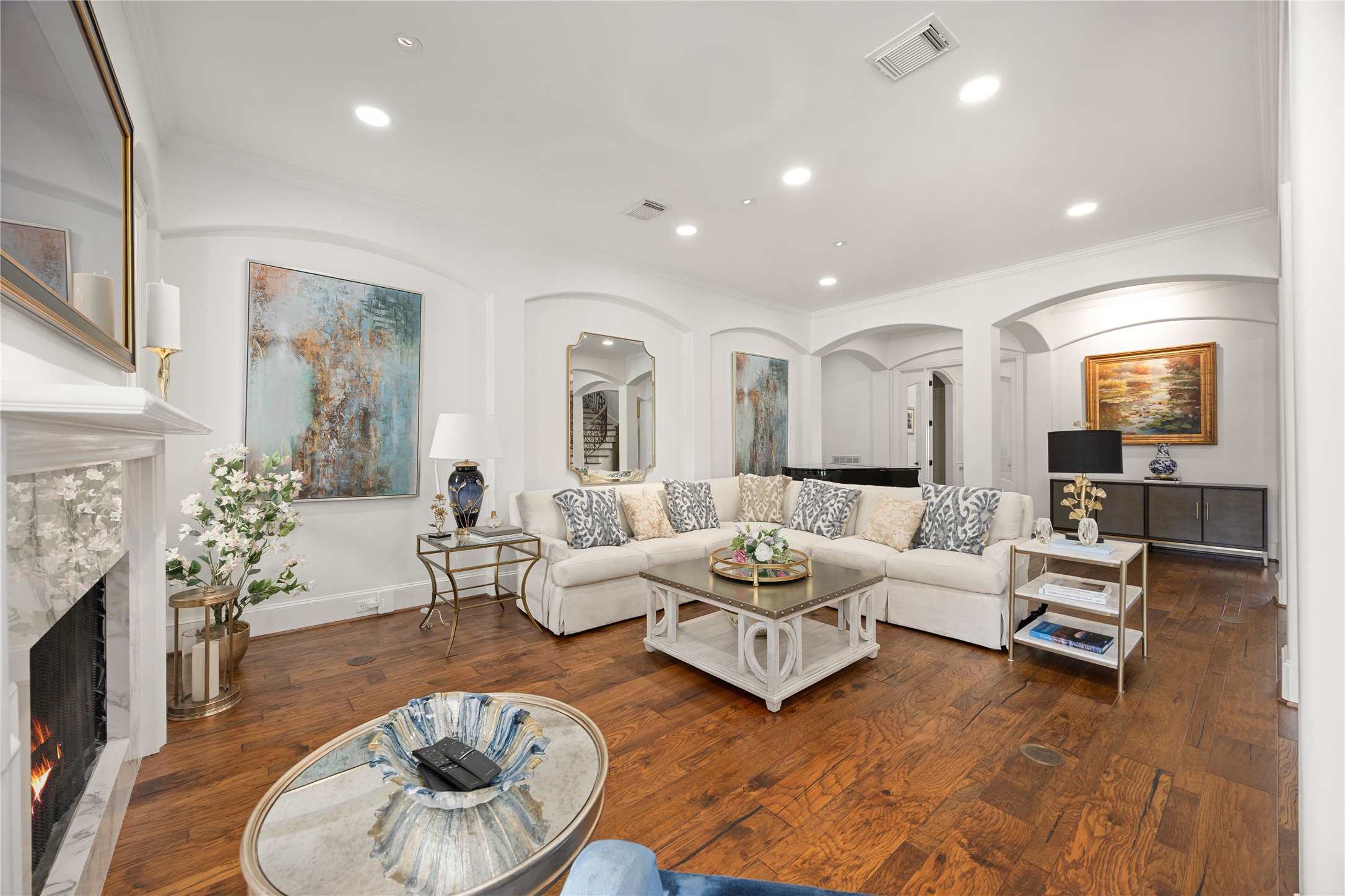 The Formal Living room is spacious has a fireplace.