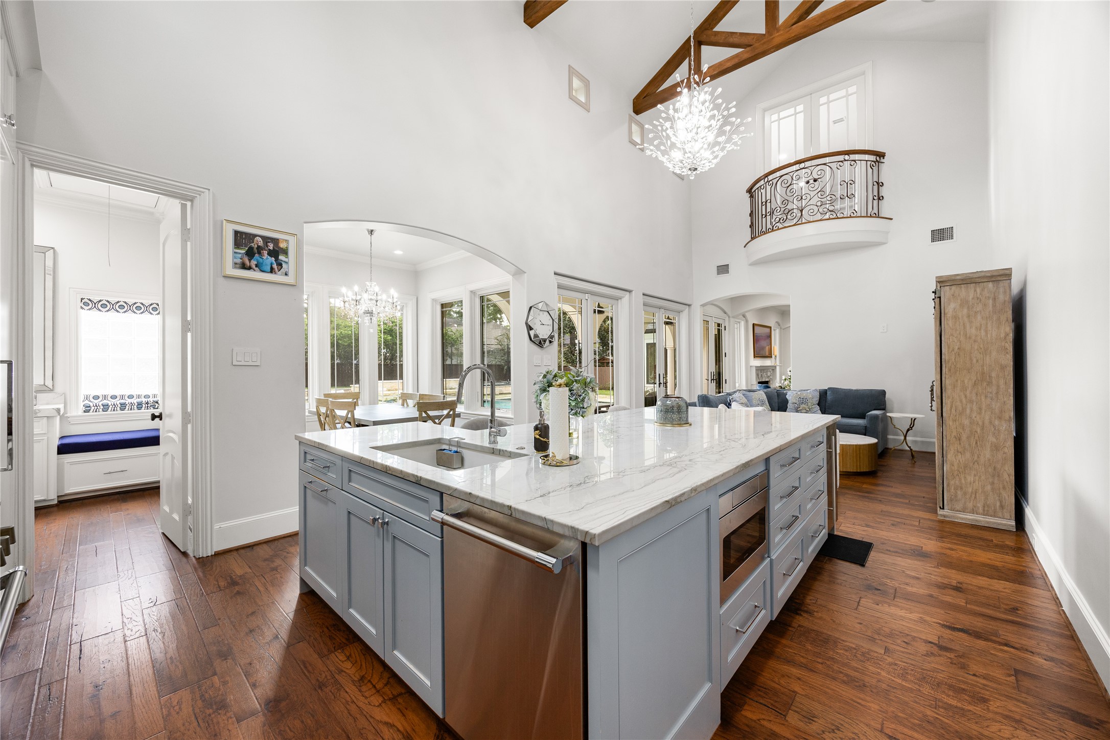 Kitchen is open to the Family room and the breakfast room and has vaulted ceilings.