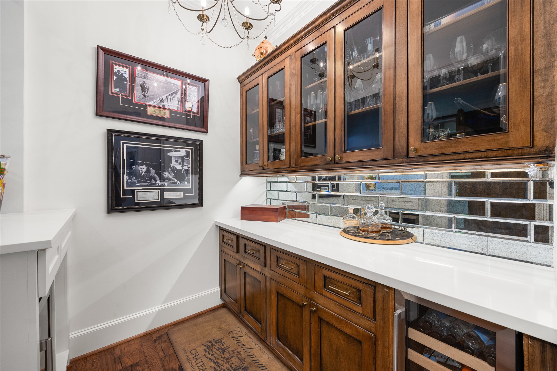 Dry Bar area connects the Kitchen and the Formal Dining room and has a wine fridge.