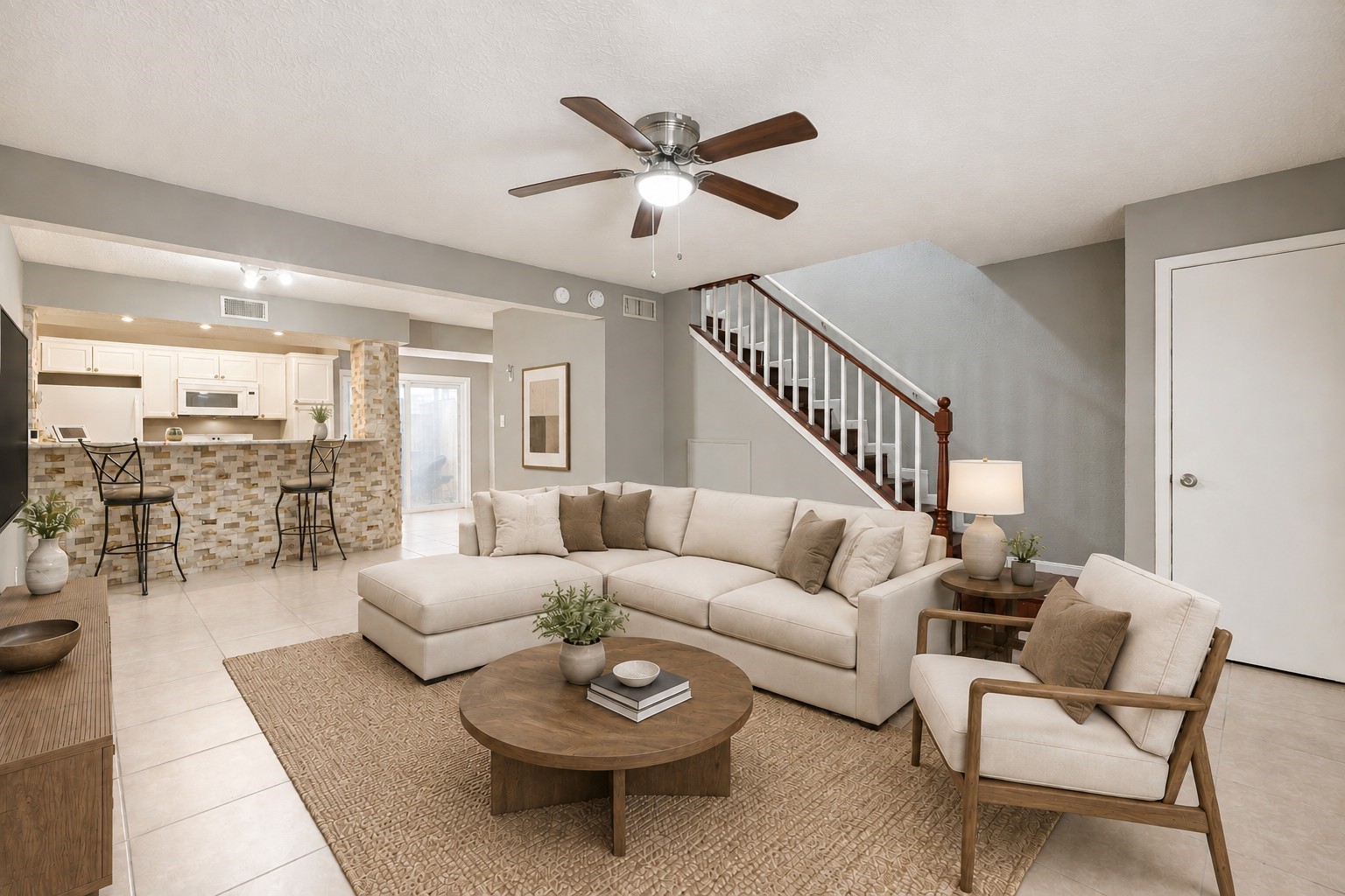 Welcome to Unit 50 in the Beverly Village Townhome community! The spacious living room is open to the dining area and kitchen and features modern finishes. Welcome to Unit 50 in the Beverly Village Townhome community! The spacious living room is open to the dining area and kitchen and features modern finishes.