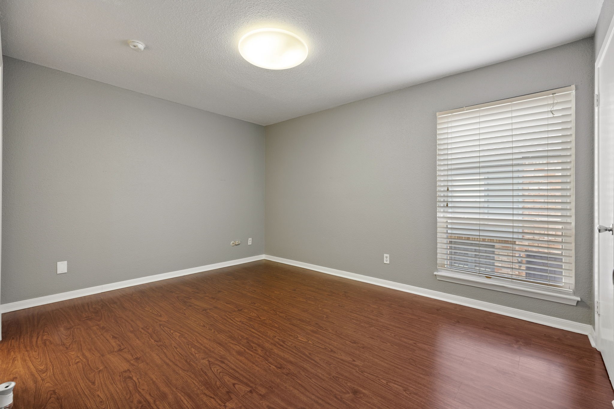 Bedroom 2 is also located upstairs and has its own bathroom and large closet space.