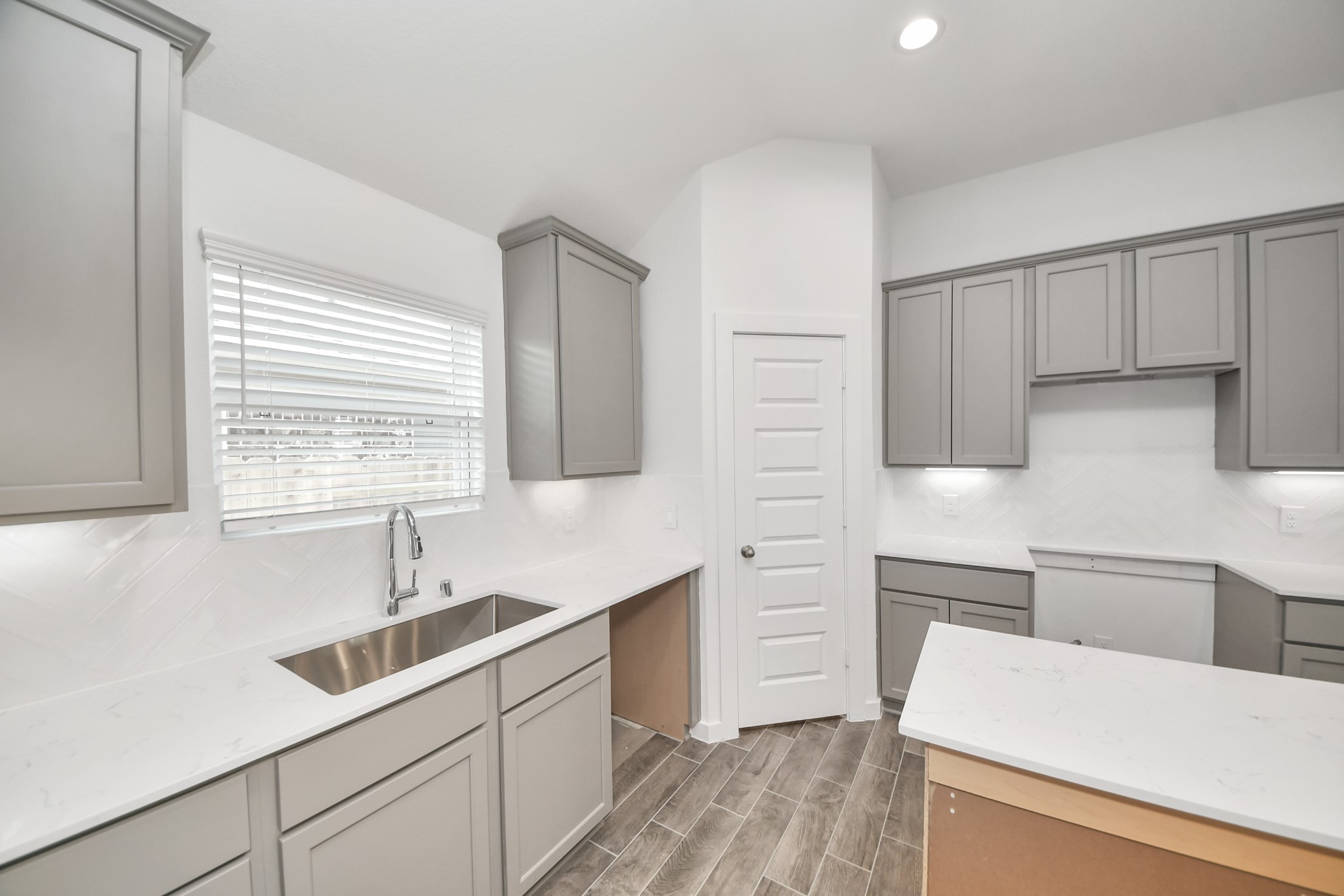 This generously spacious kitchen is a dream realized! Sample photo of completed home with similar floor plan. Actual colors and selections may vary.