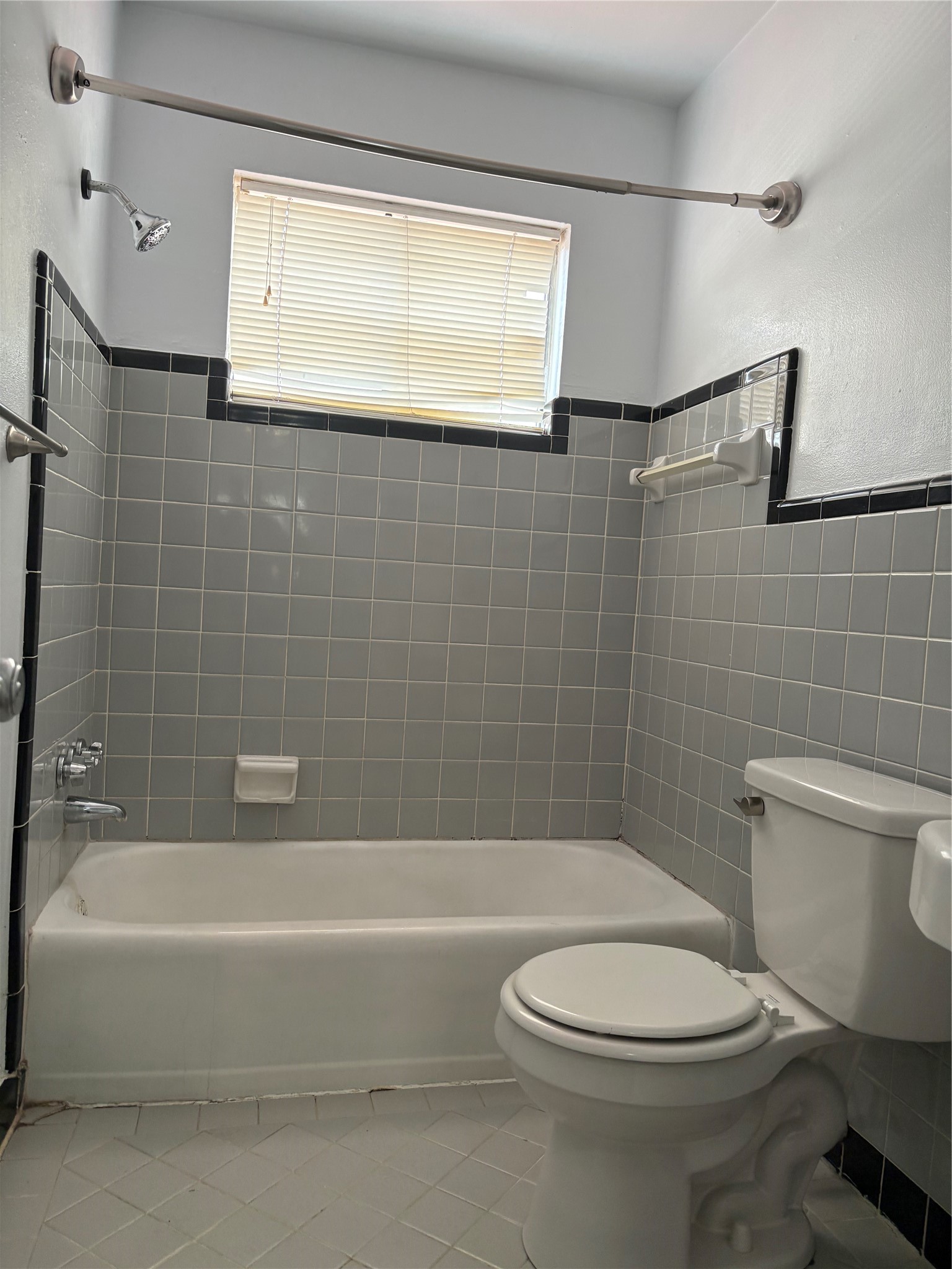 Bathroom with shower tub combo