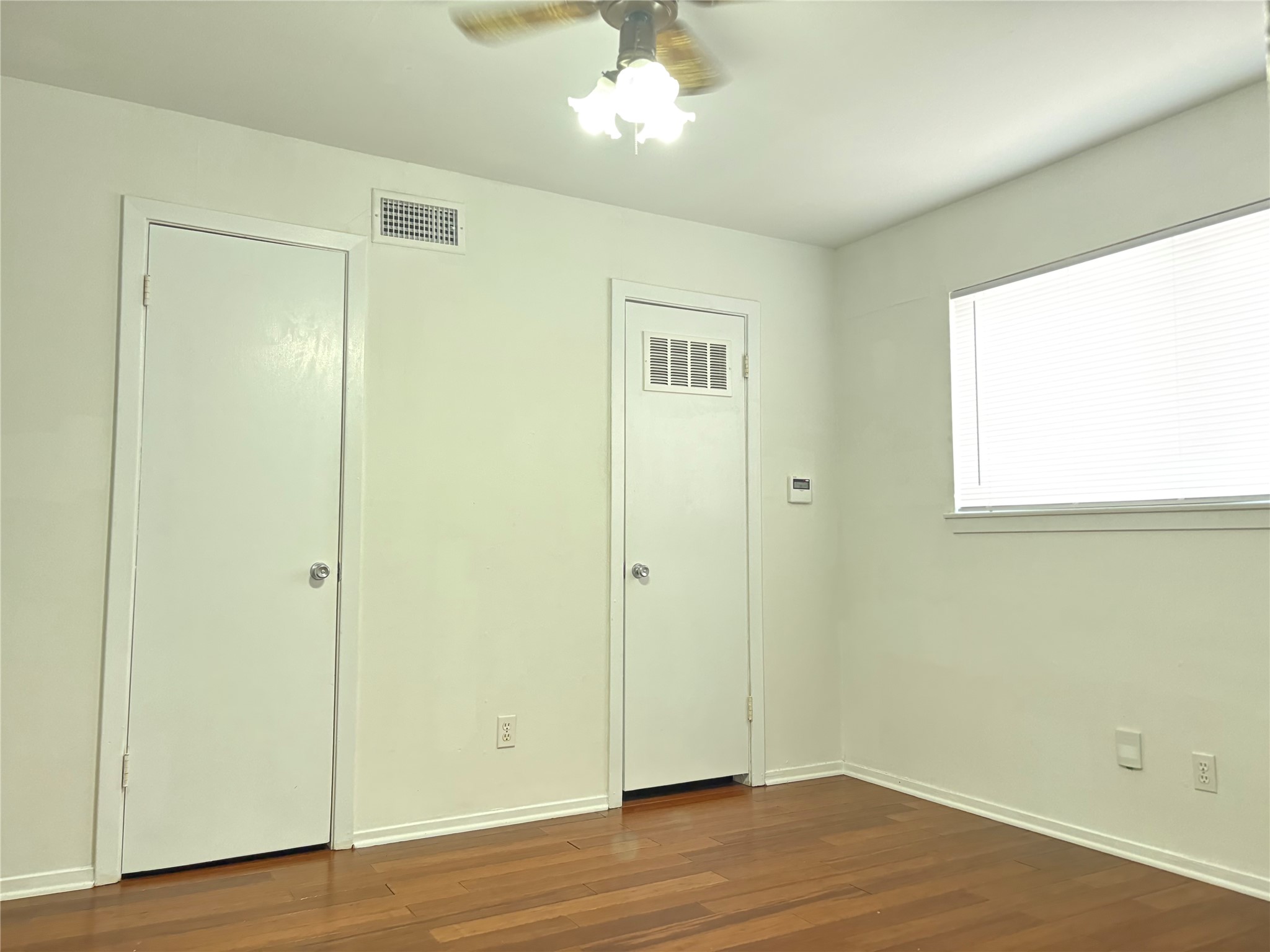 Bedroom with dual Closets