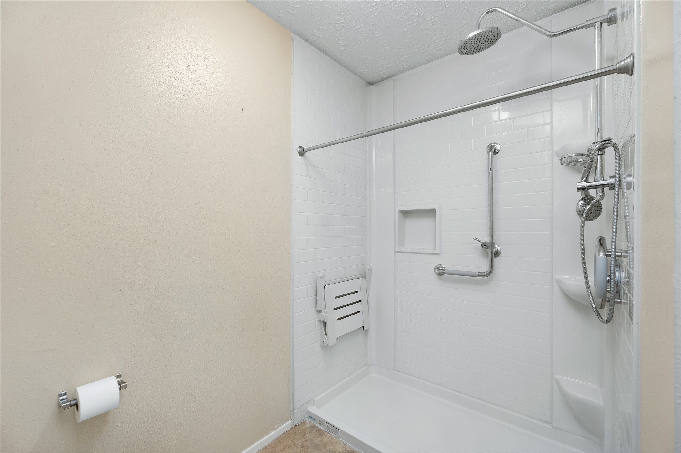 New sit in shower, in primary bedroom
