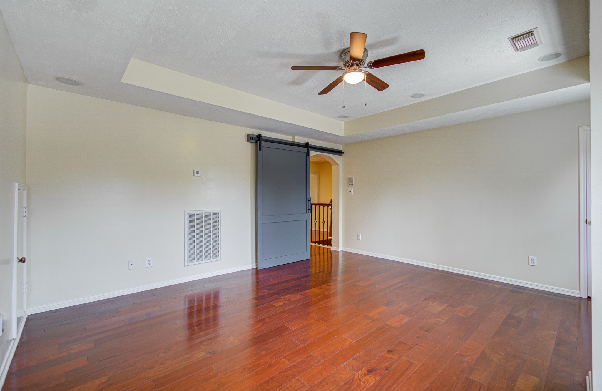Barn Door on the gameroom to seperate it into a space for all  to enjoy