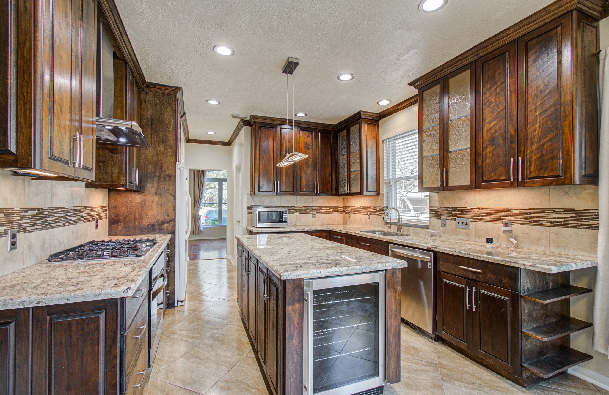 Please notice the upgraded backsplash and upgraded range cooktop