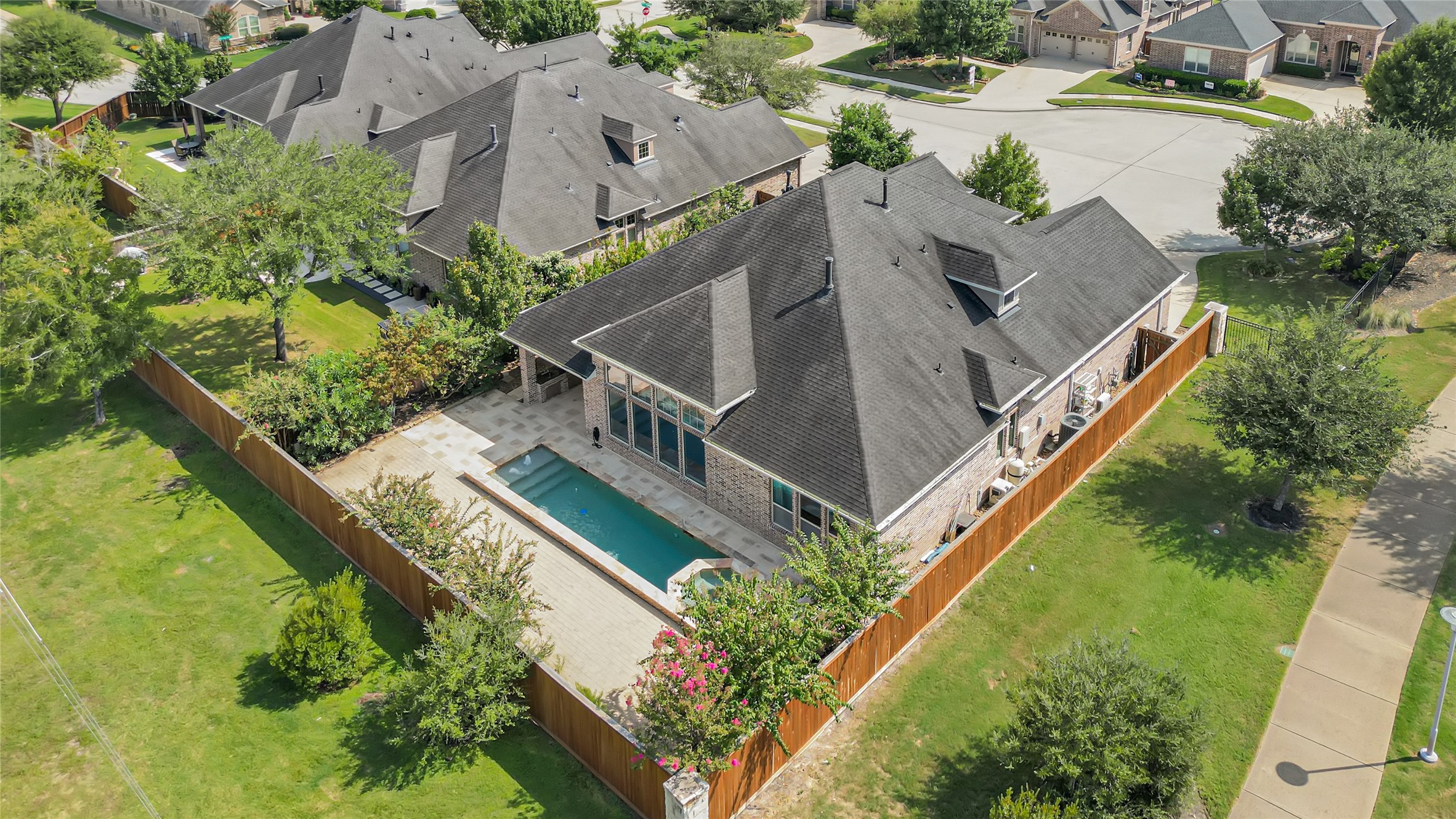 Stunning custom Mediterranean one-story with game room up, perfectly situated on a quiet cul-de-sac in Towne Lakes sought-after active adult community! This beautiful all-brick home offers your own private backyard oasis featuring a sparkling custom pool & spa surrounded by gorgeous travertine tile, an outdoor kitchen, fruit trees & a walking trail just beyond the backyard! HOA-maintained front yard adds to the carefree lifestyle. Designed for relaxing and entertaining!