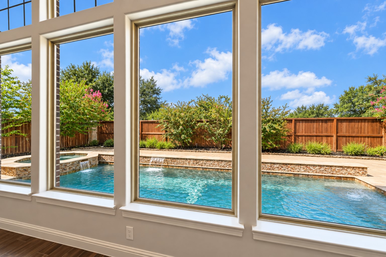 Just look at that breathtaking view! Relax to the soothing sound of cascading waterfalls while overlooking your sparkling custom pool & spa. Your own private backyard oasis awaitspeaceful, beautiful & the perfect place to unwind at the end of the day!