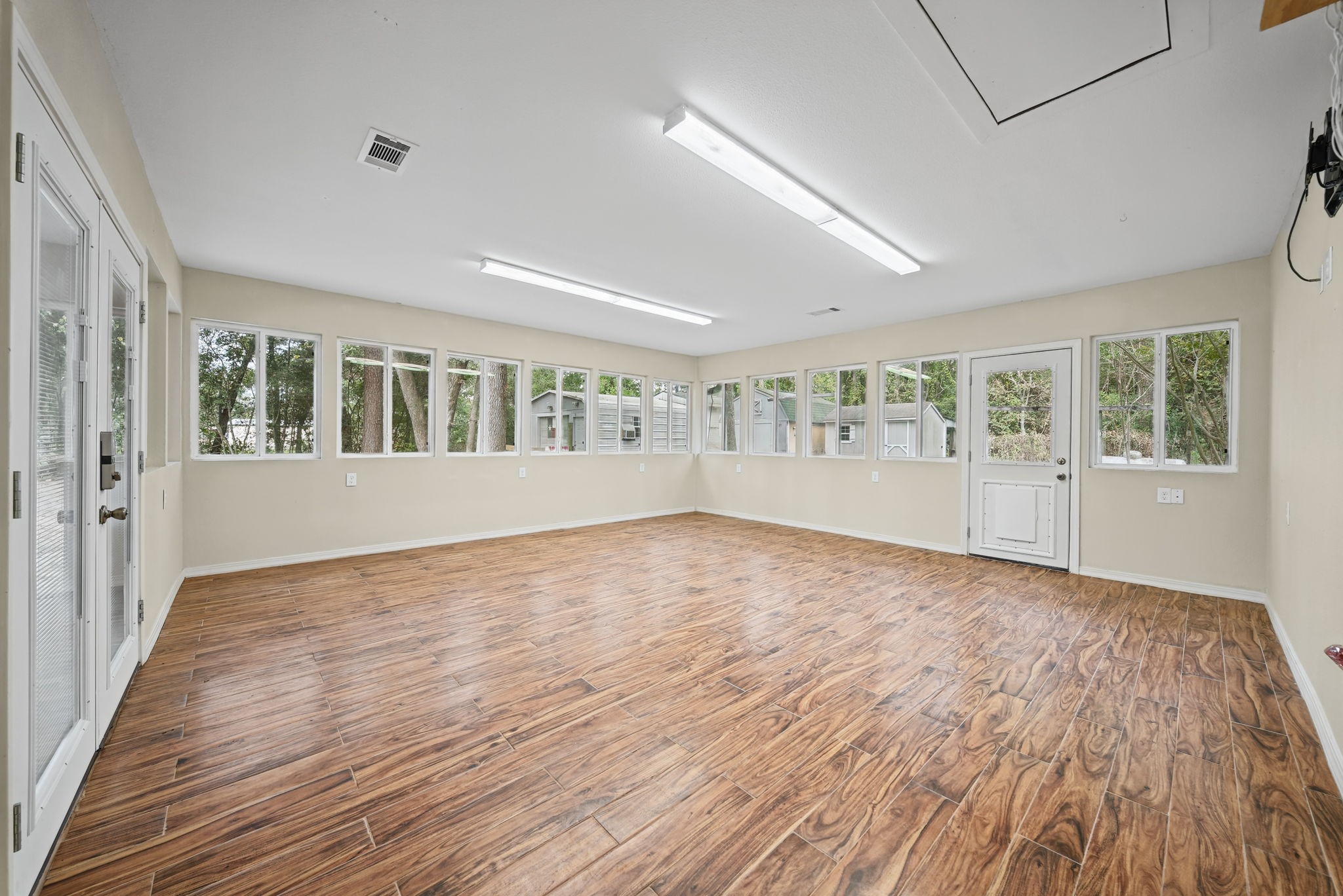 Sunroom/Study/School Room/Home Gym Located off the kitchen.