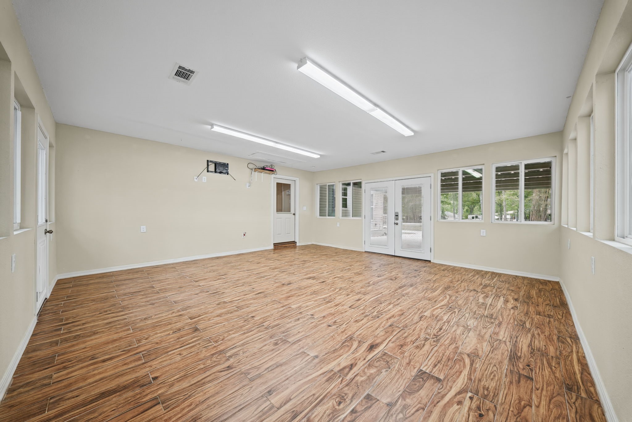 Sunroom/Study/School Room/Home Gym Located off the kitchen.