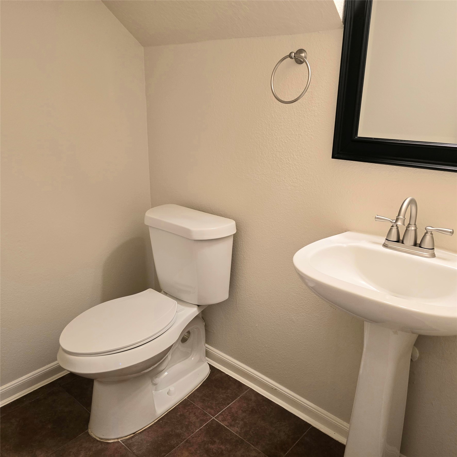 1/2 bath downstairs. Convenient for guests.