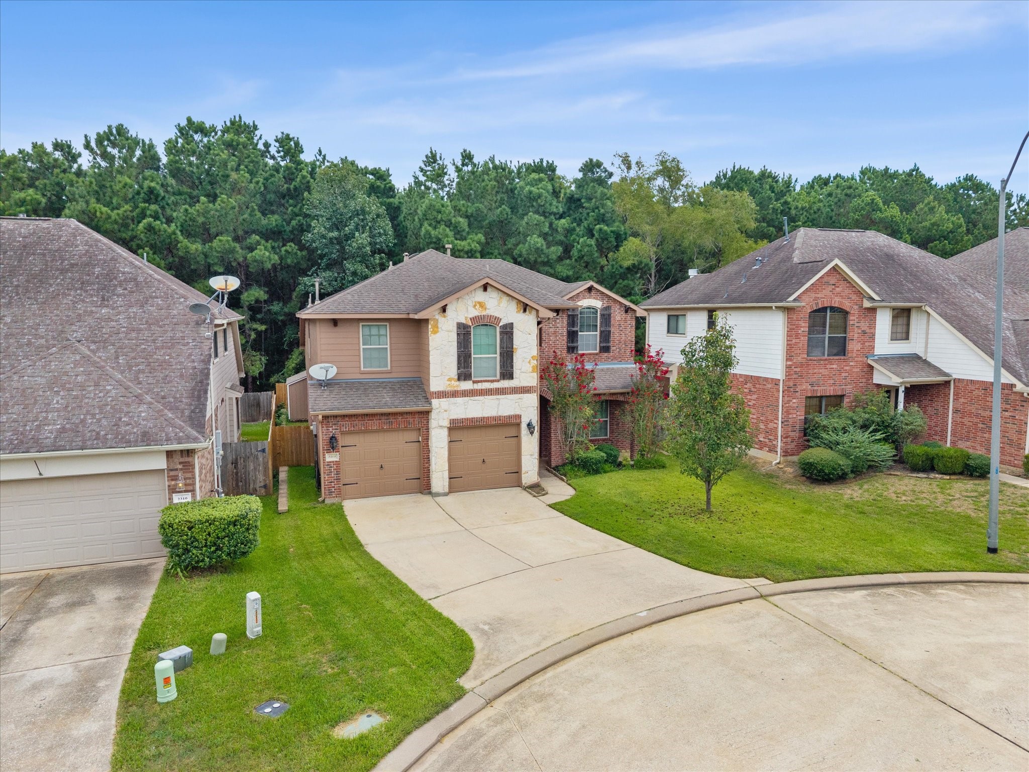 Charming two-story home situated on a quiet cul-de-sac with great curb appeal, attached two-car garage, and a private backyard lot backed by dense forest reserves.