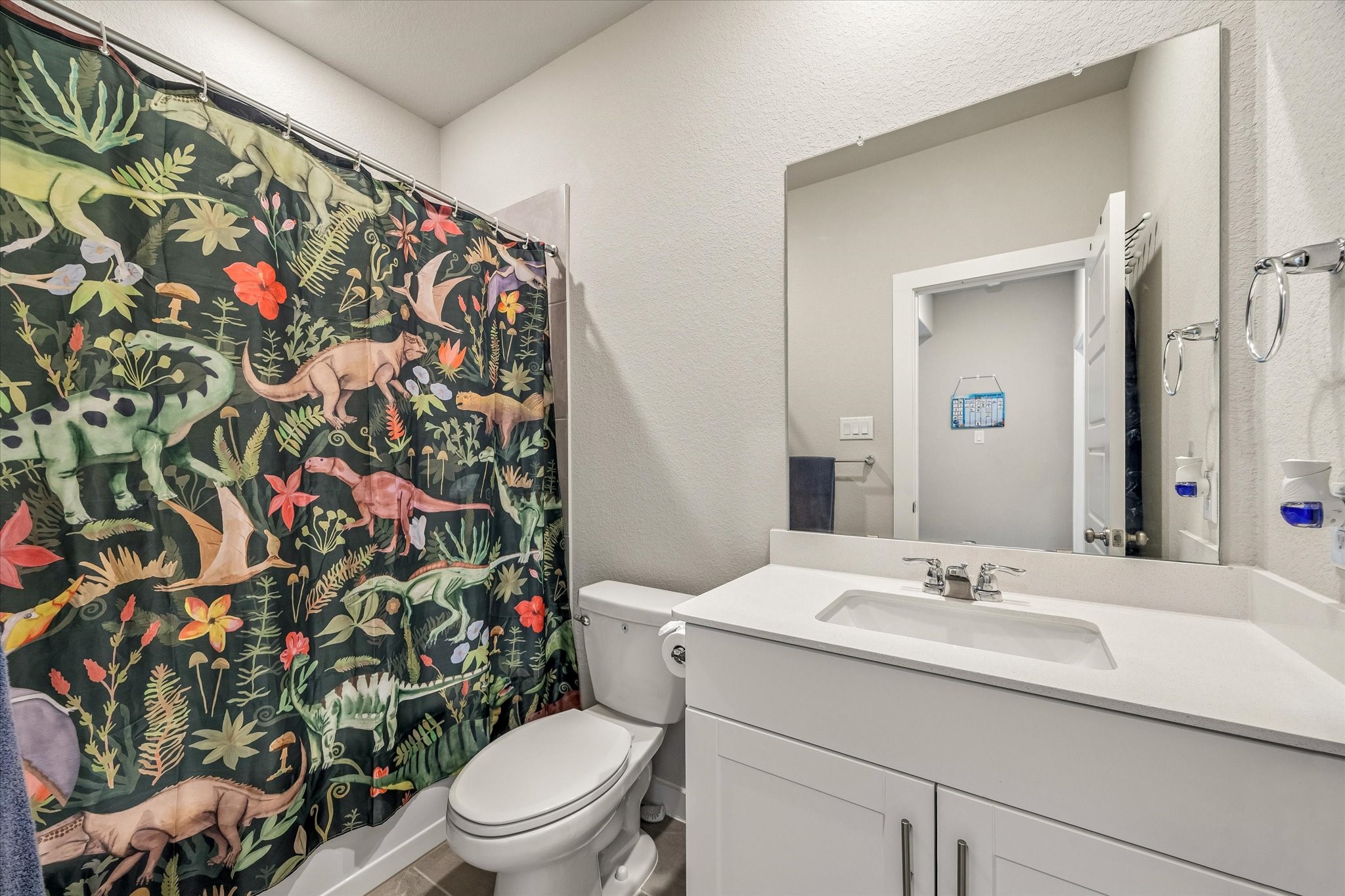 Secondary full bathroom provides convenient accommodations for guests and additional household members.