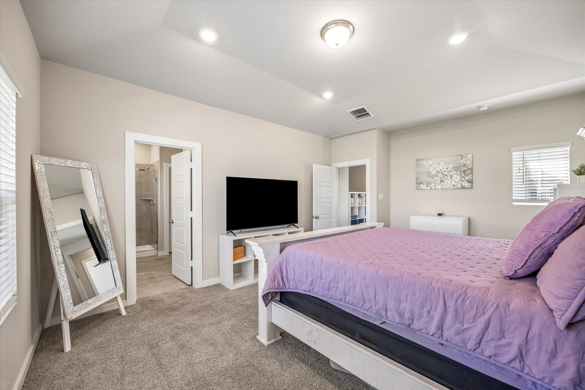 Another look at the primary suite highlights the opportunity to create a personal sanctuary tailored to your taste and daily routine.