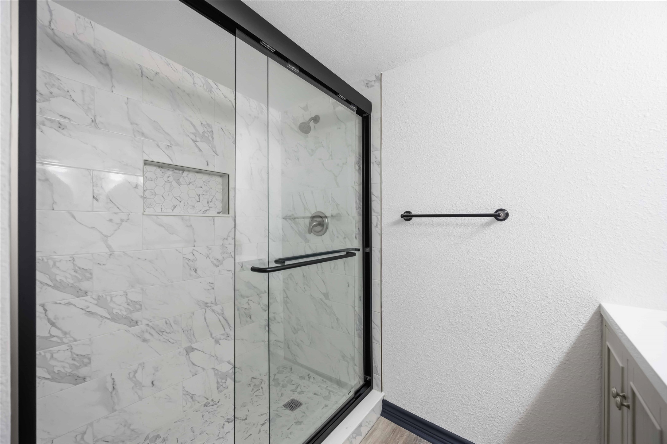 Closer view of the large walk-in shower.