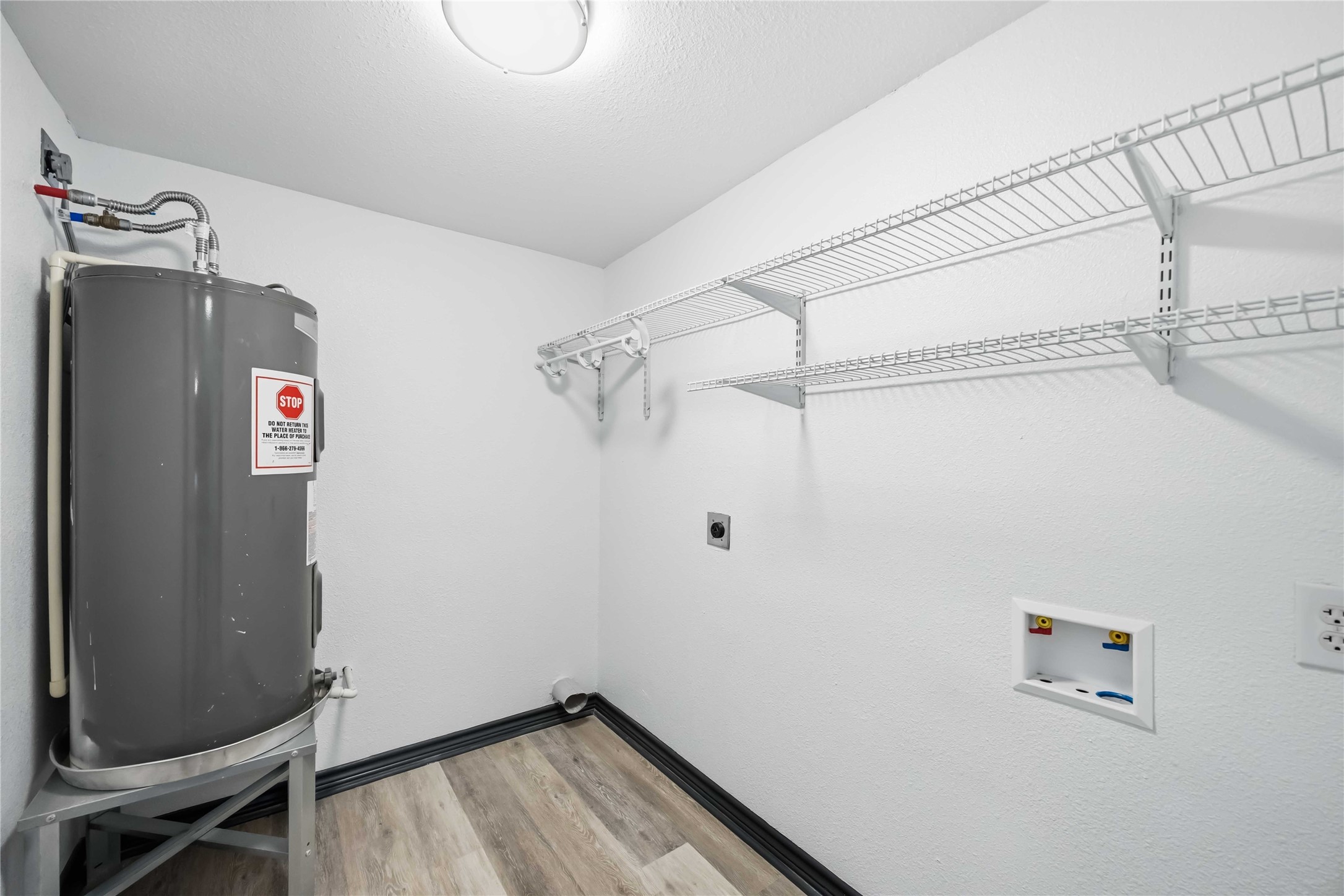 Utility room with plenty of storage.