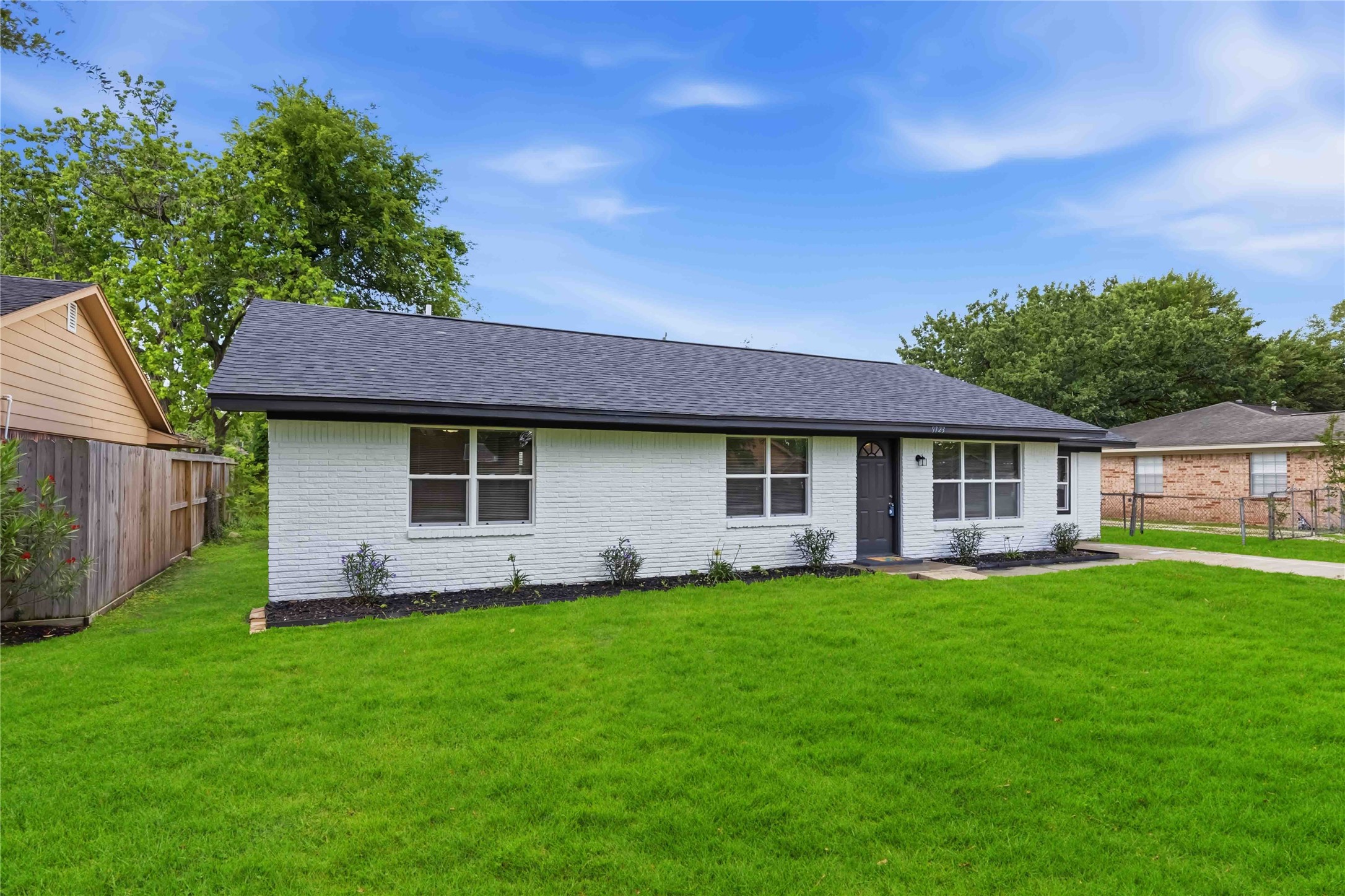 Large front yard and a beautiful front elevation.