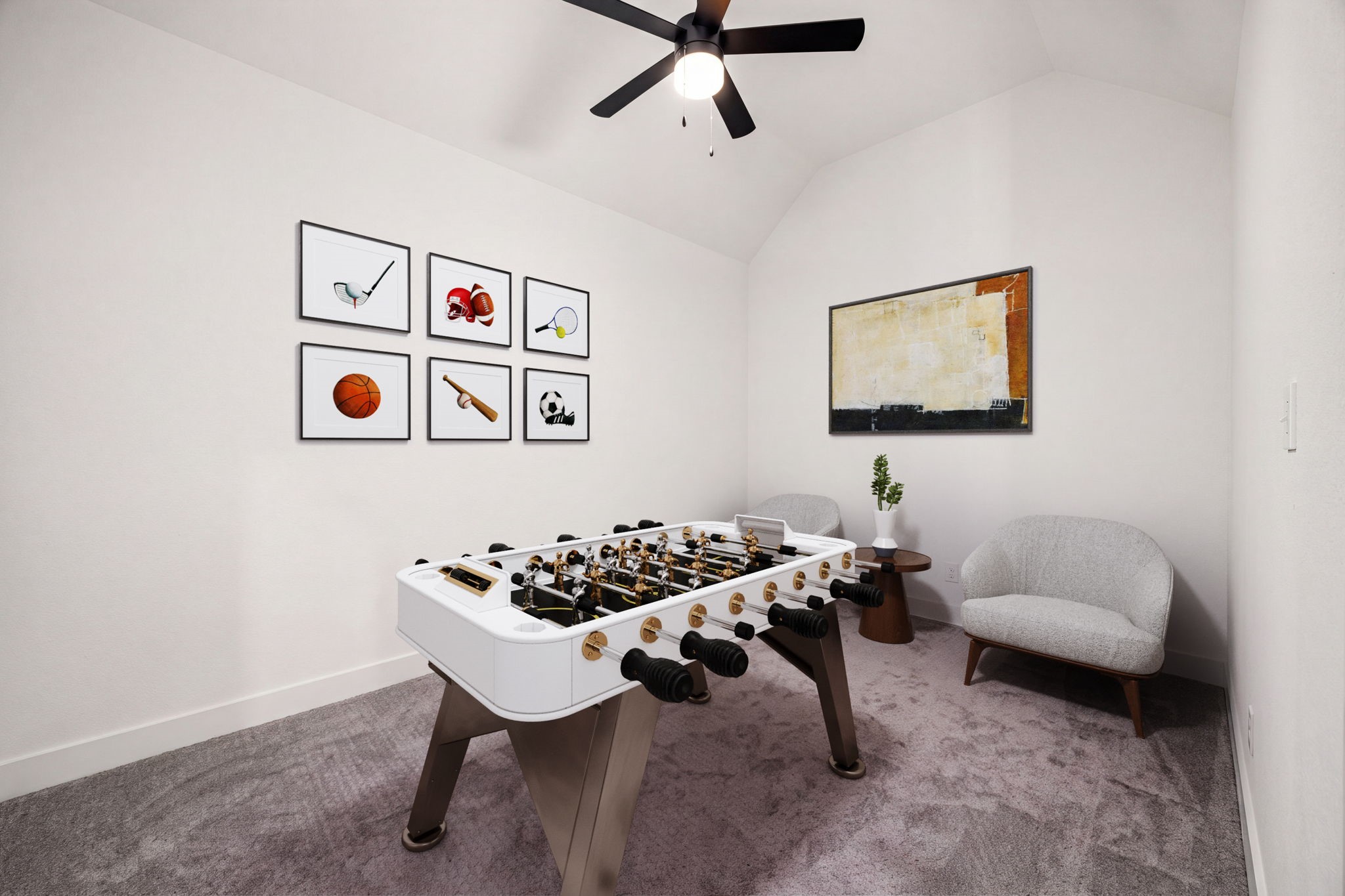The perfect flexible game or media room. Plush neutral carpeting grounds this versatile entertainment space, highlighted by soaring vaulted ceilings and a modern multi-blade ceiling fan with integrated lighting.