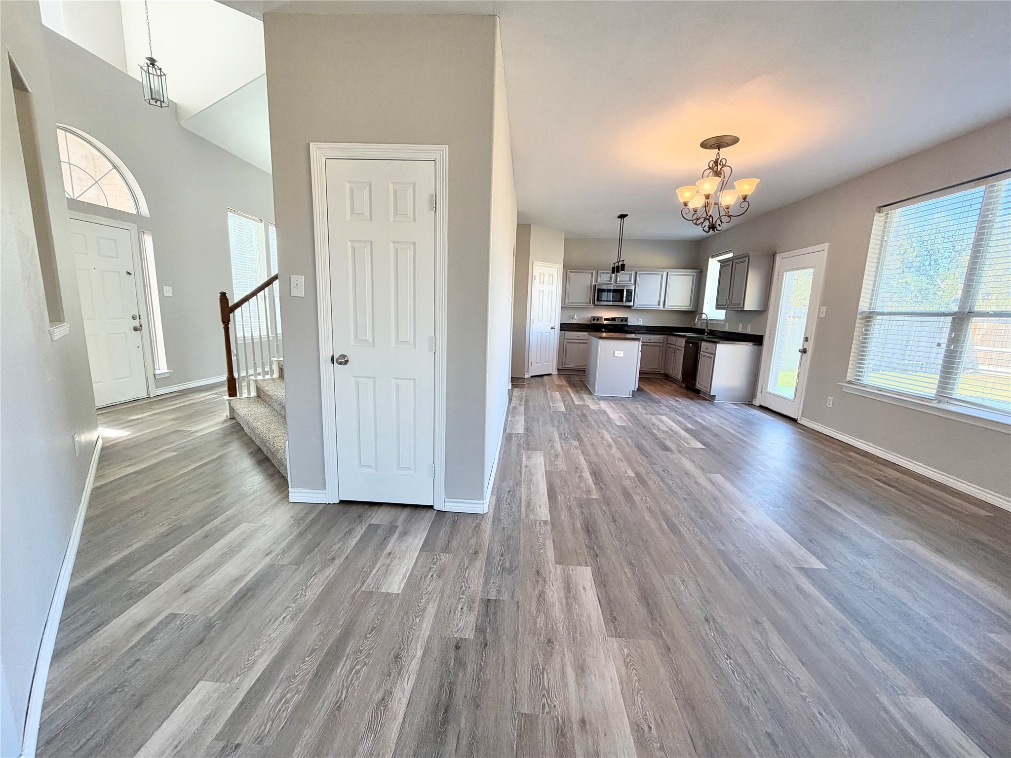 Lots of additional storage under the stairwell. This is an entertaining dream home, look at this flow.