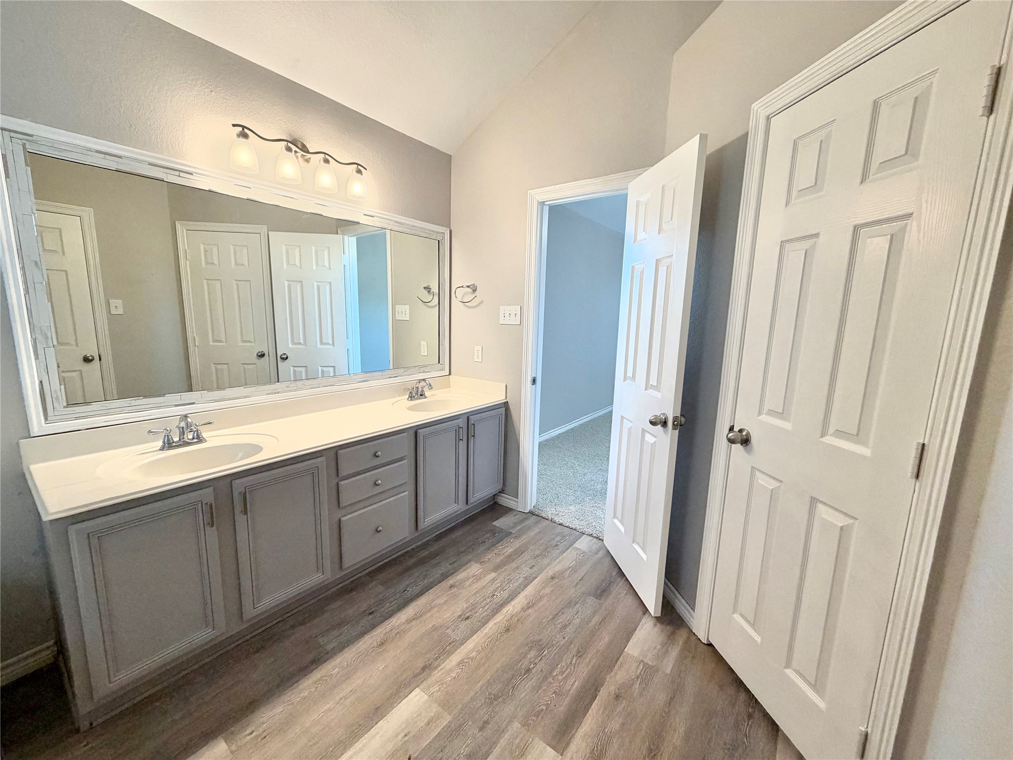 Complete with his and her's vanities