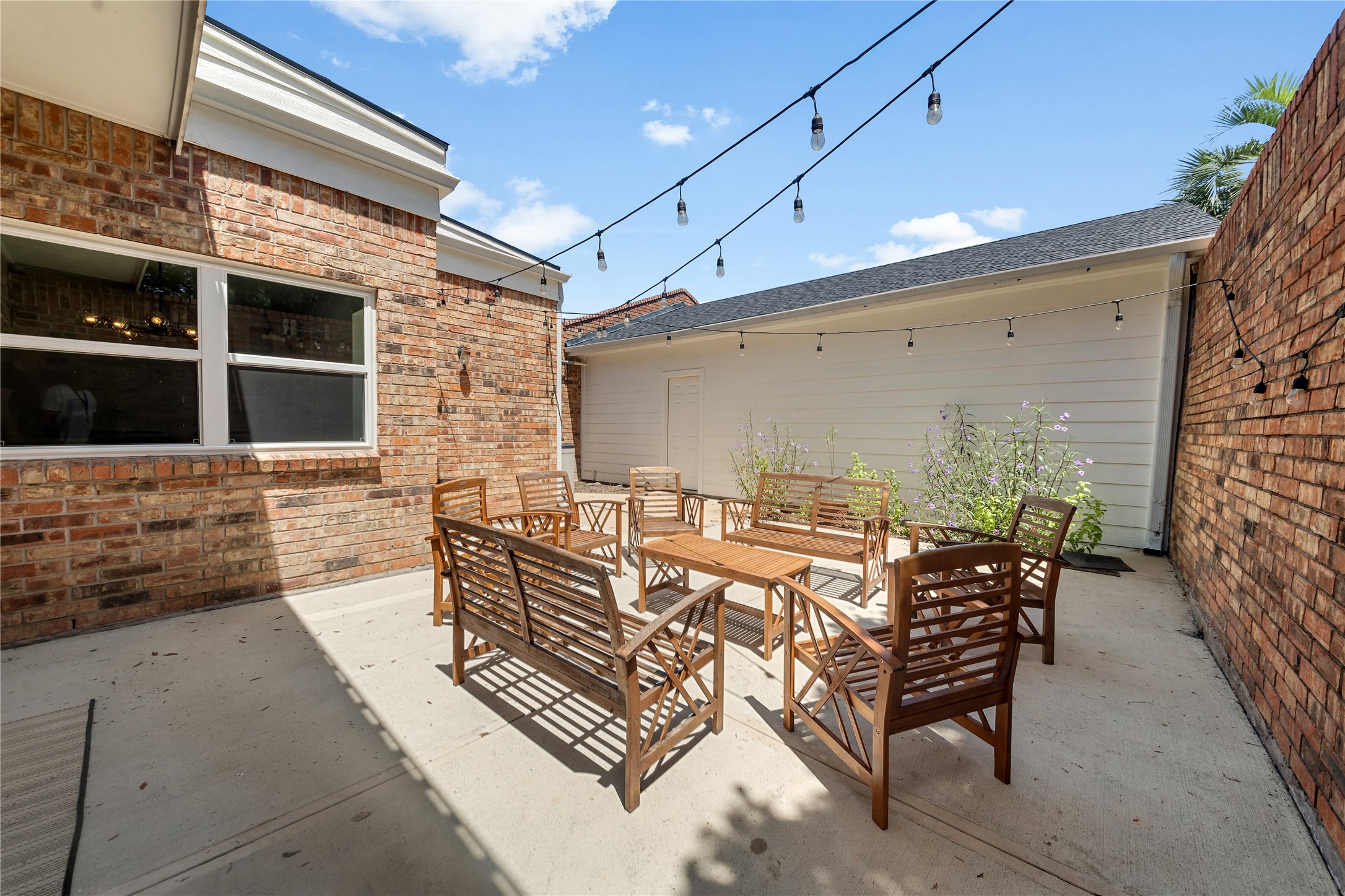 Step outside to enjoy two private patios and a balcony, where you can sip your morning coffee, unwind in the evening, or simply enjoy the peaceful surroundings beneath mature trees.