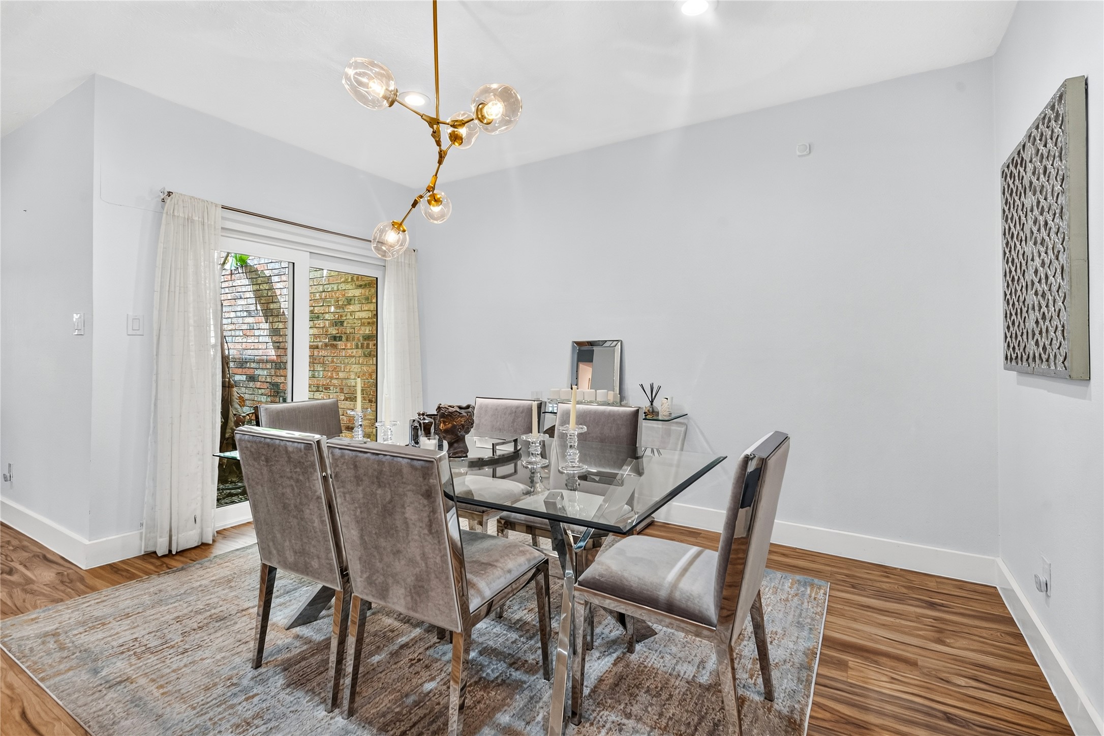 Beautiful formal dinning area with a view of a little courtyard Beautiful formal dinning area with a view of a little courtyard