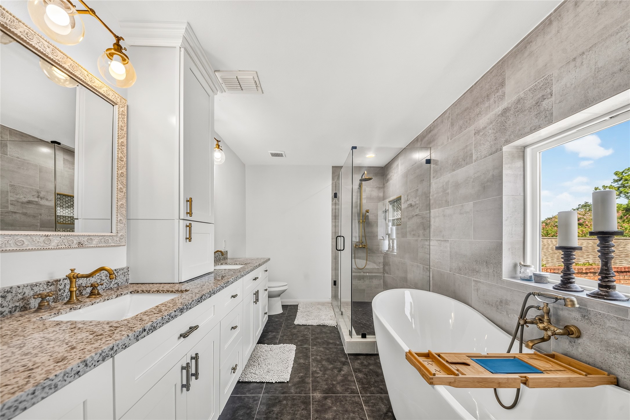 Step into a spa-inspired primary bathroom designed for both comfort and style Step into a spa-inspired primary bathroom designed for both comfort and style