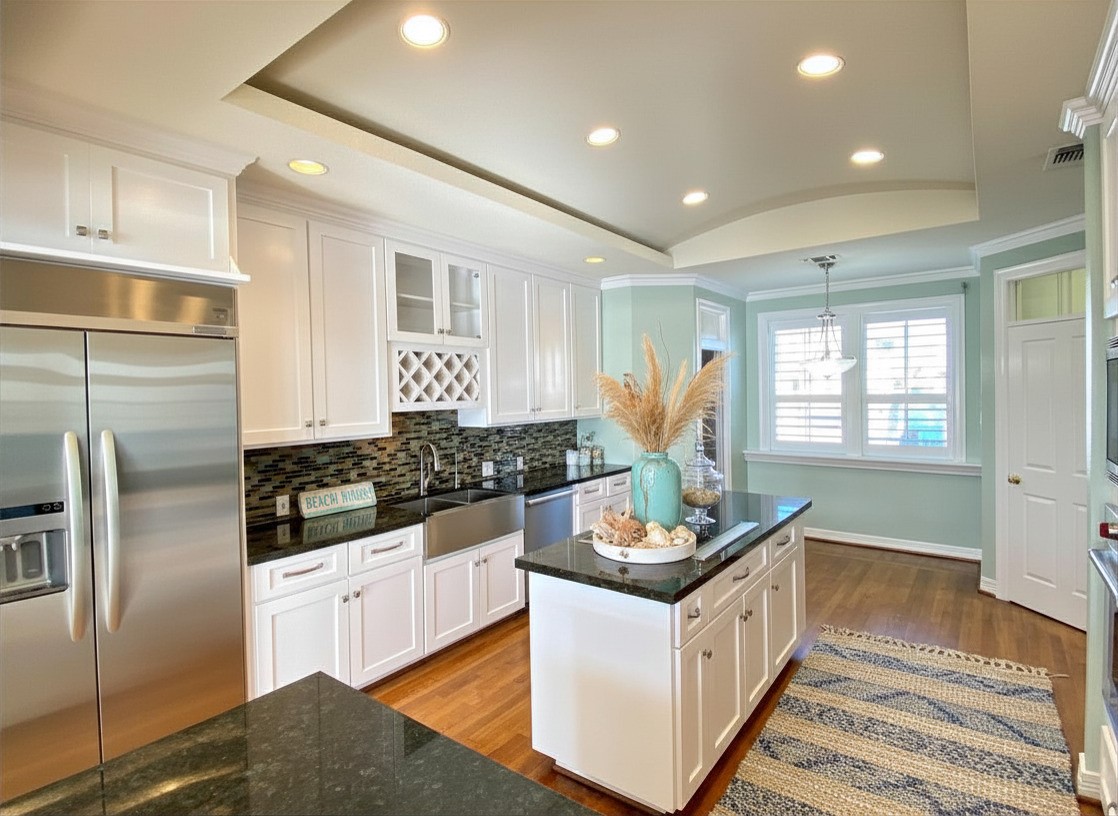 Virtual staging done to highlight the island prep space.