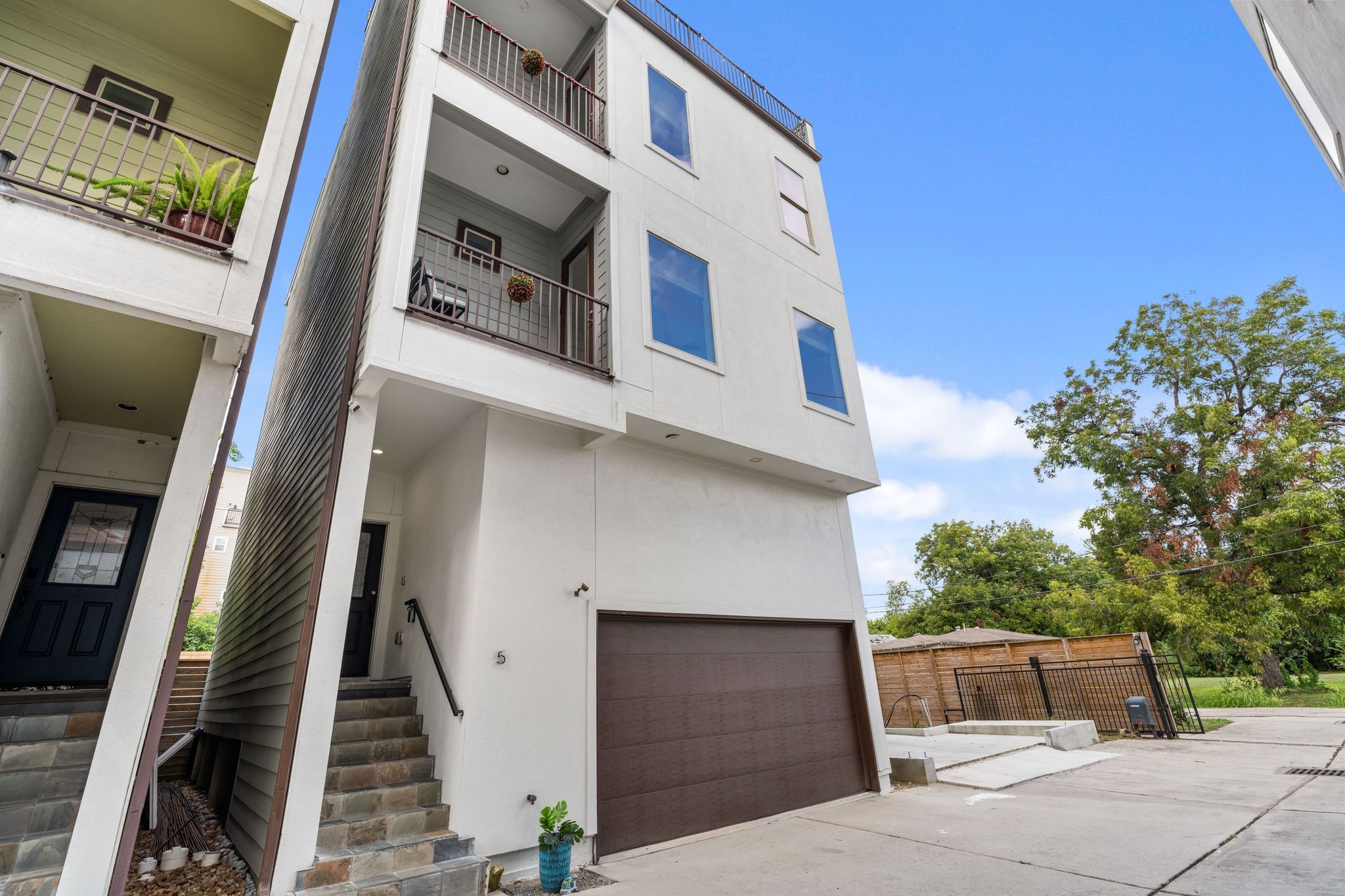 Exterior of the home, located within a gated community.