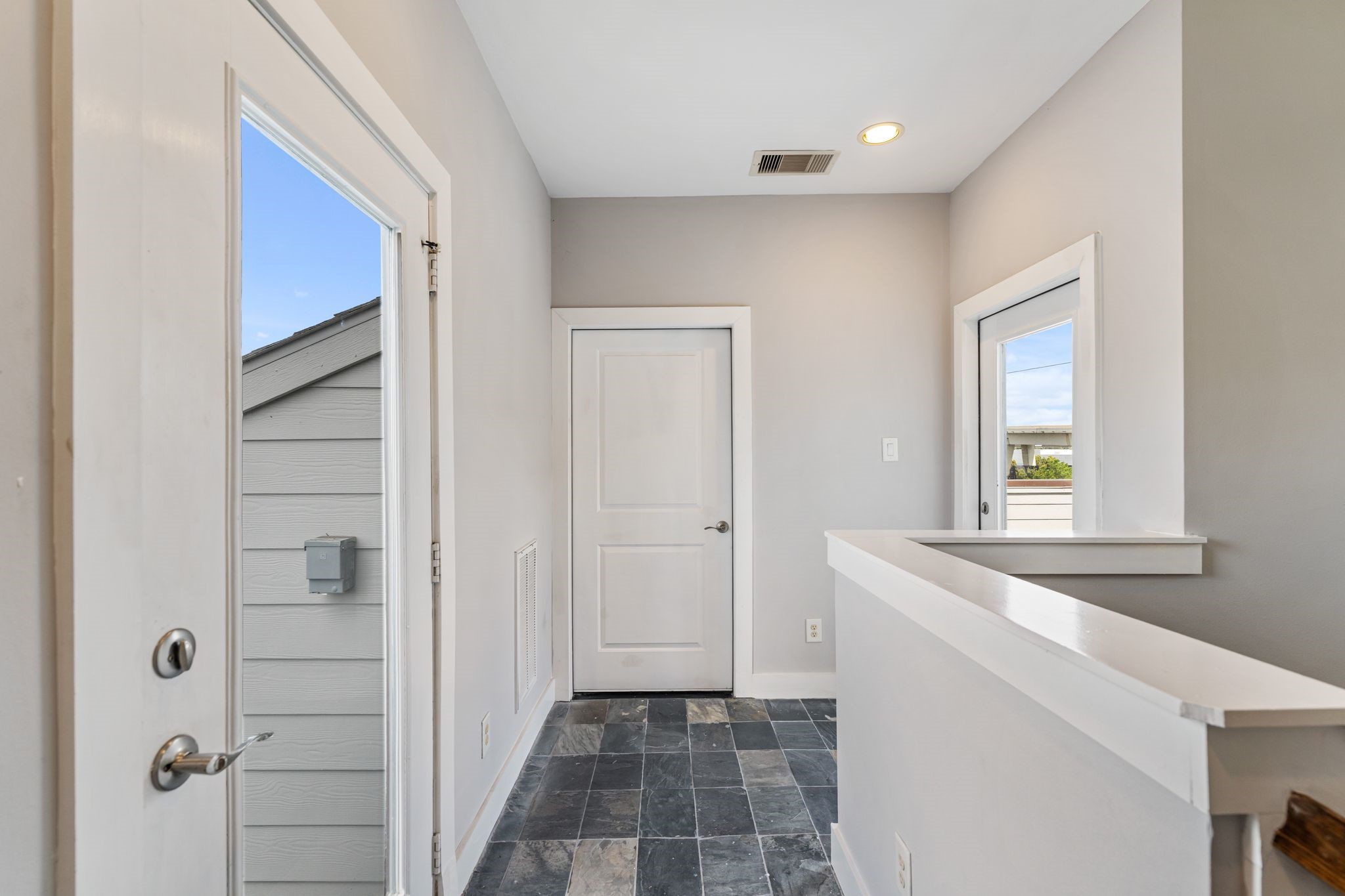 Fourth-floor landing leading to the outdoor entertaining space.