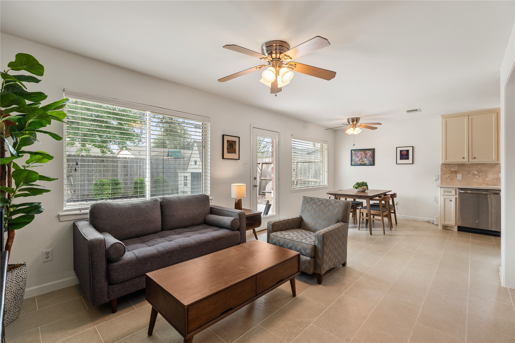 Open concept living area connects seamlessly to the kitchen for an effortless flow. Open concept living area connects seamlessly to the kitchen for an effortless flow.