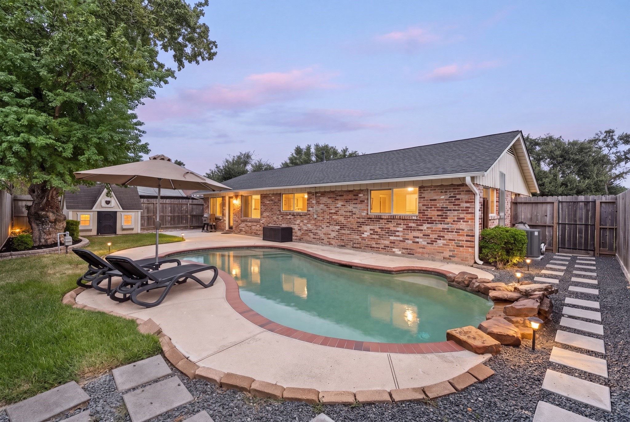 From hot Houston afternoons by the pool to quiet evenings at home, this backyard was made to be enjoyed. From hot Houston afternoons by the pool to quiet evenings at home, this backyard was made to be enjoyed.