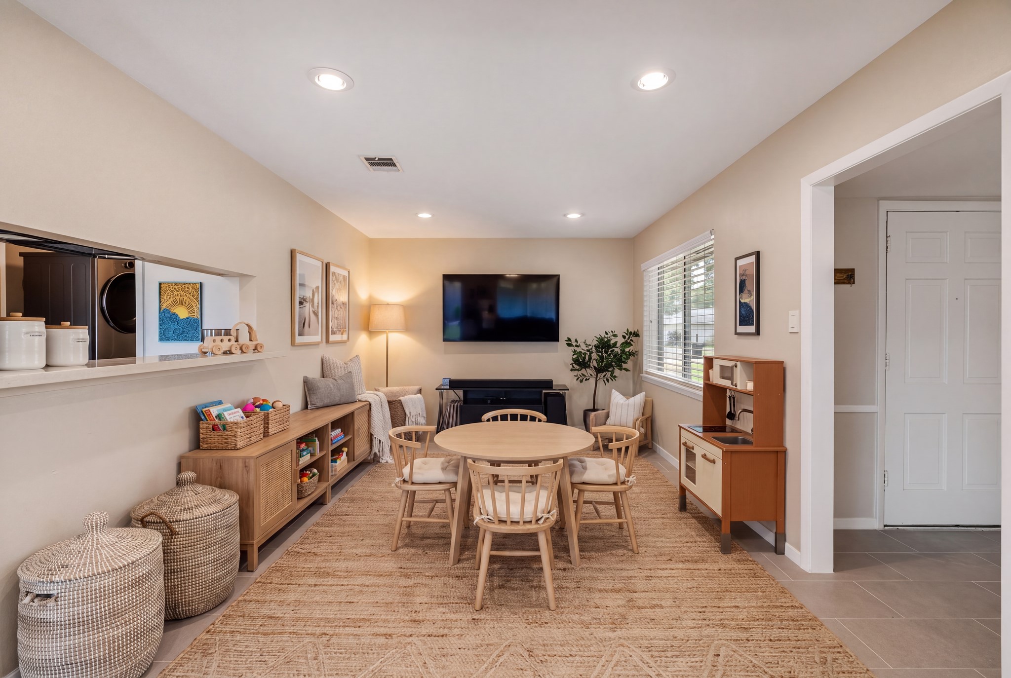 Virtually designed family room staged as a playroom