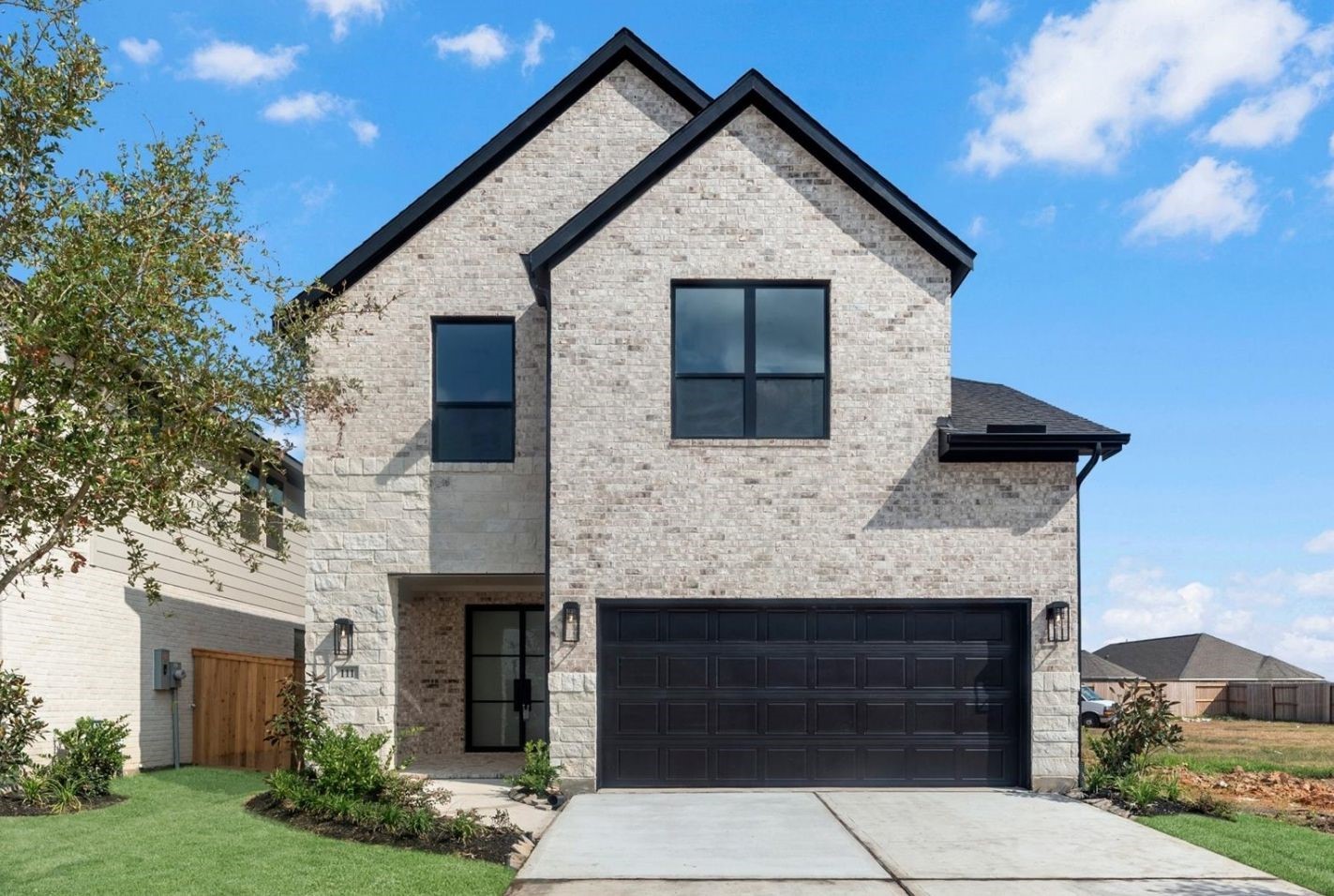 Move-In Ready! Westin Homes | Manor  New Construction. Grass is digitally enhanced.