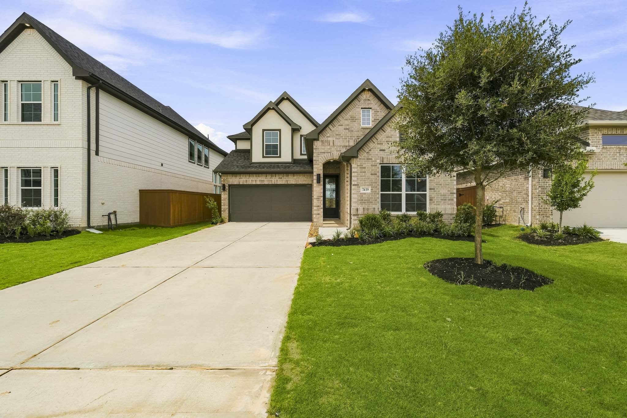 The home is finished in both brick and stucco. The home is finished in both brick and stucco.