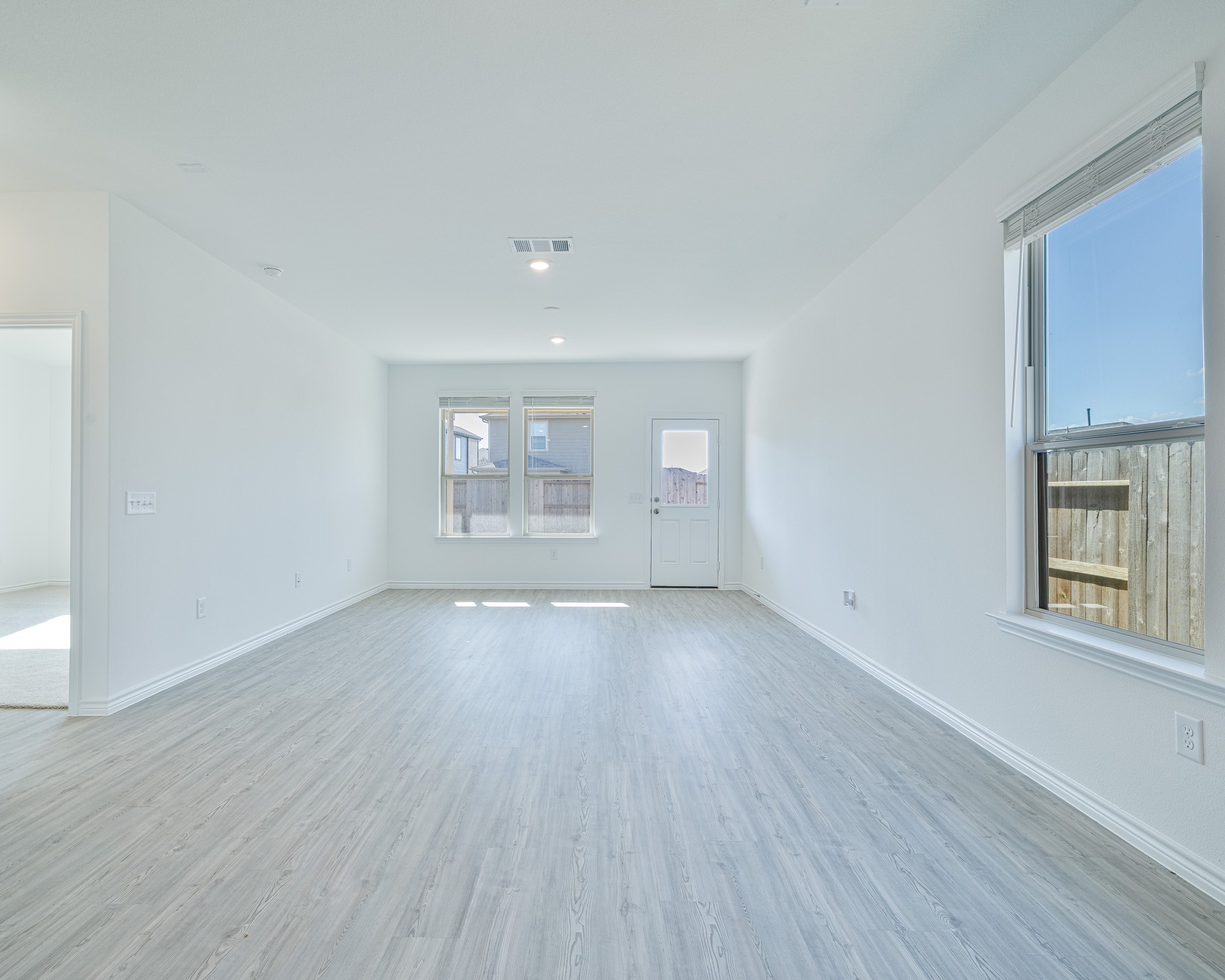 Bright and spacious living area with natural light