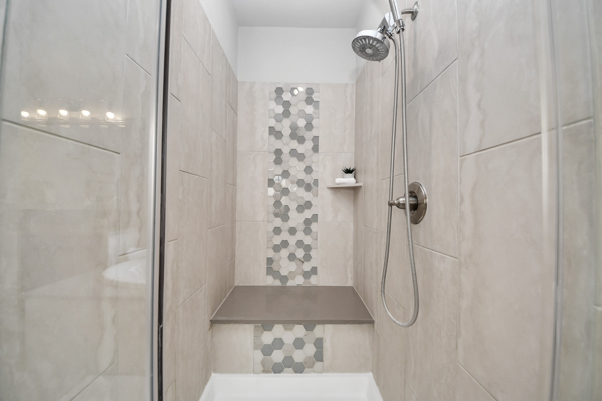 A look into the walk-in shower in primary bathroom