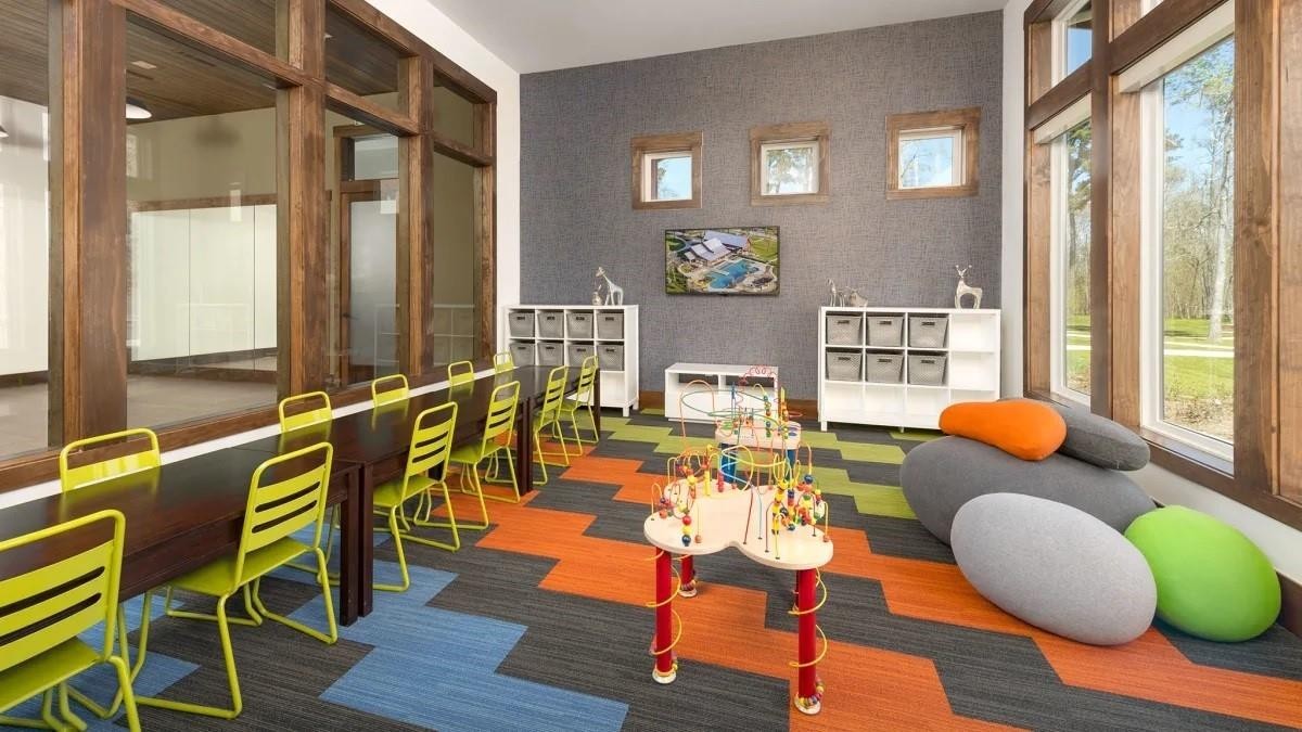 Discover a vibrant children's playroom adjacent to the fitness center, offering a perfect blend of fun and convenience for the whole family.