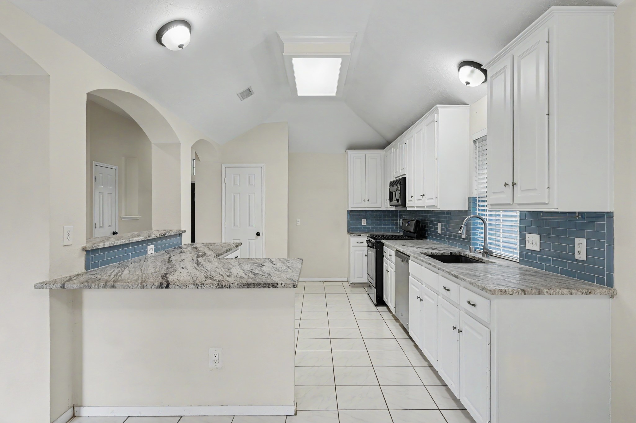 Ample counterspace make this home great for entertaining
