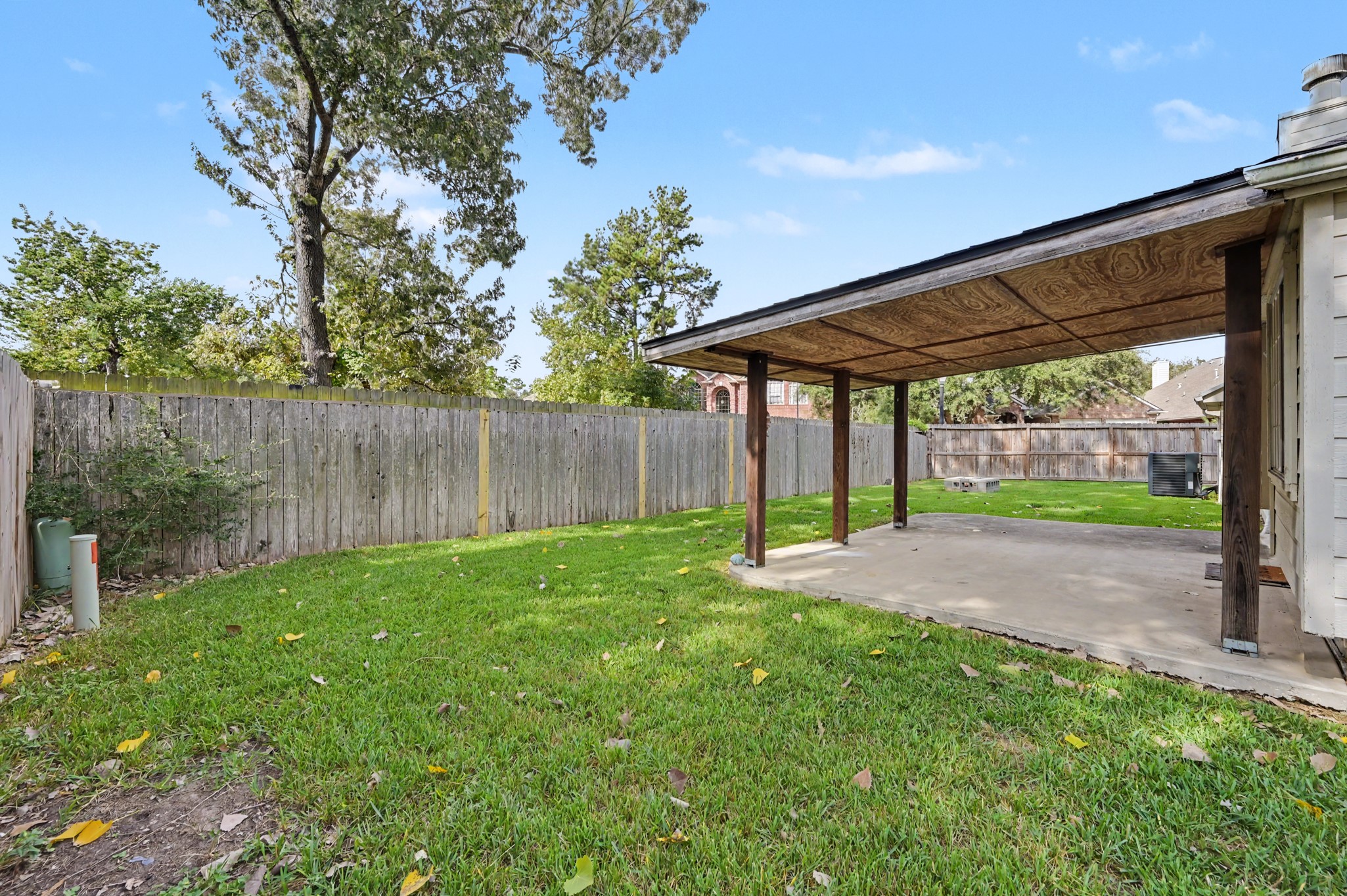 Large corner lot w/ plenty of room for a pool, storage and side yard.