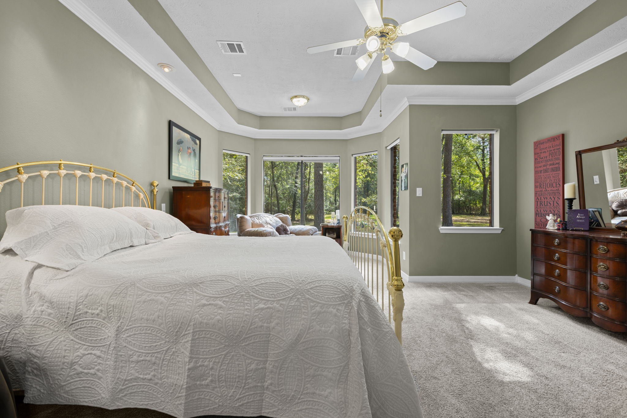 Primary Suite features sitting area and tray ceilings