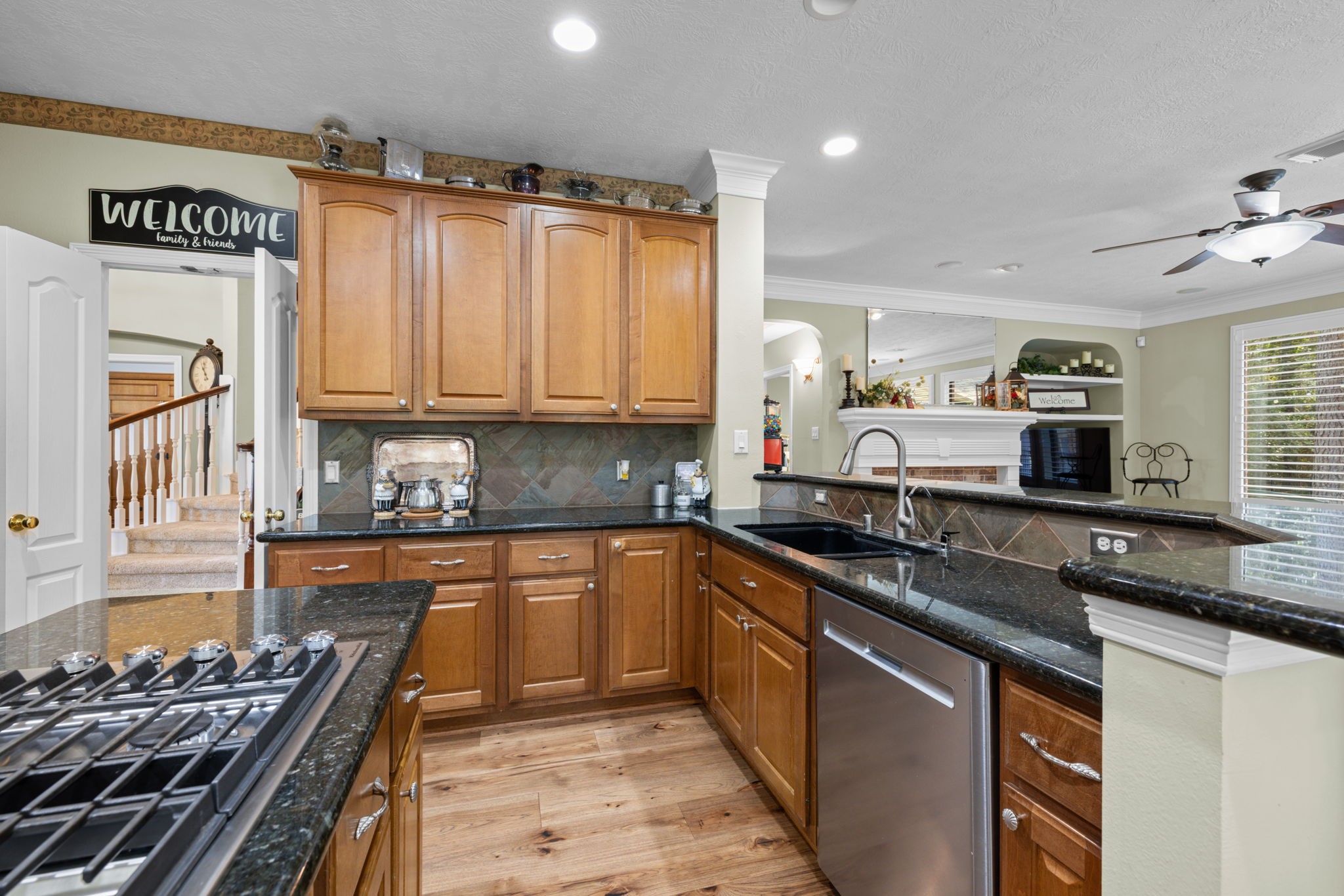 Granite countertops and gas range for meal preppng