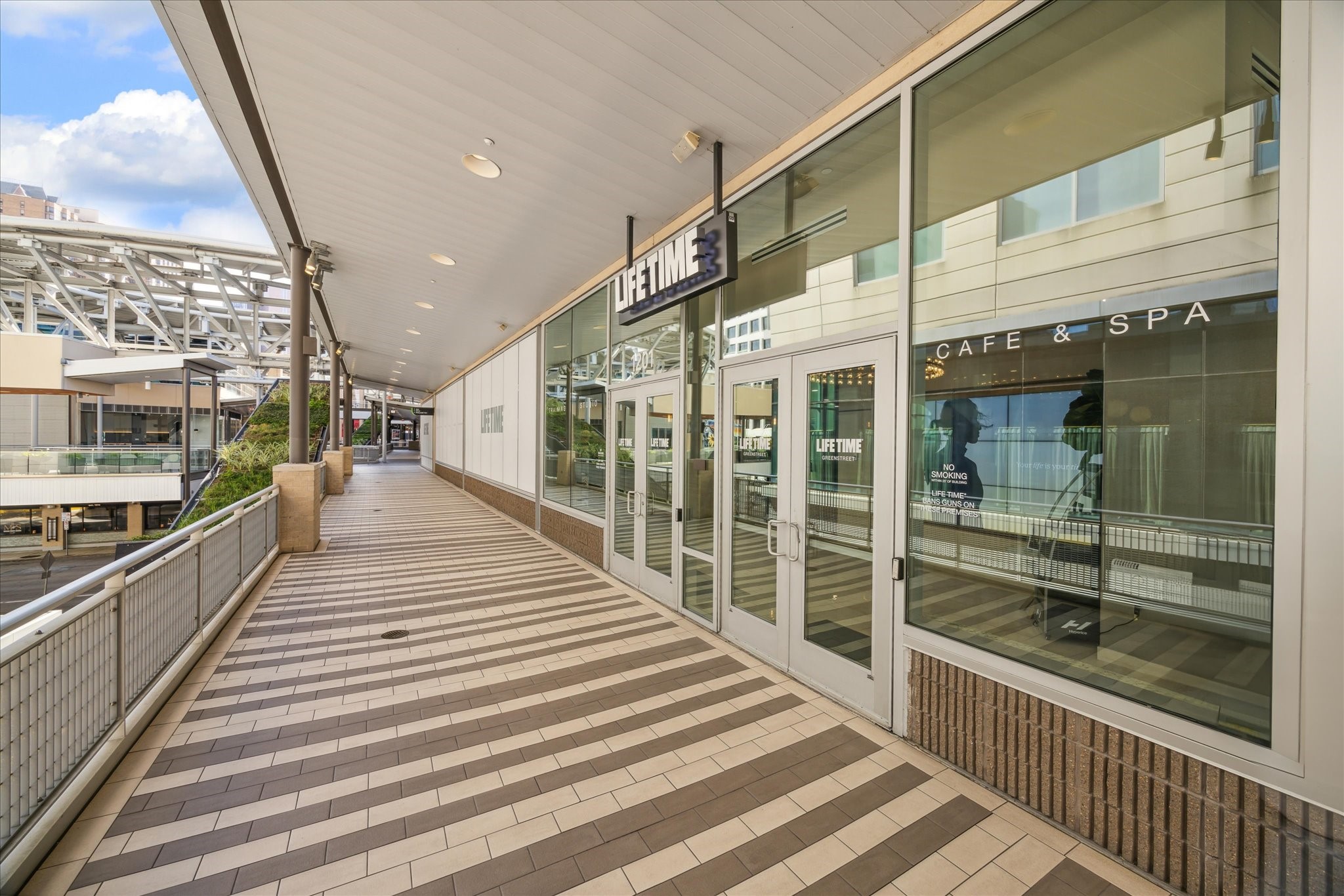 Conveniently located near a modern fitness center and spa, enjoy easy access to health and wellness amenities in a vibrant setting.
