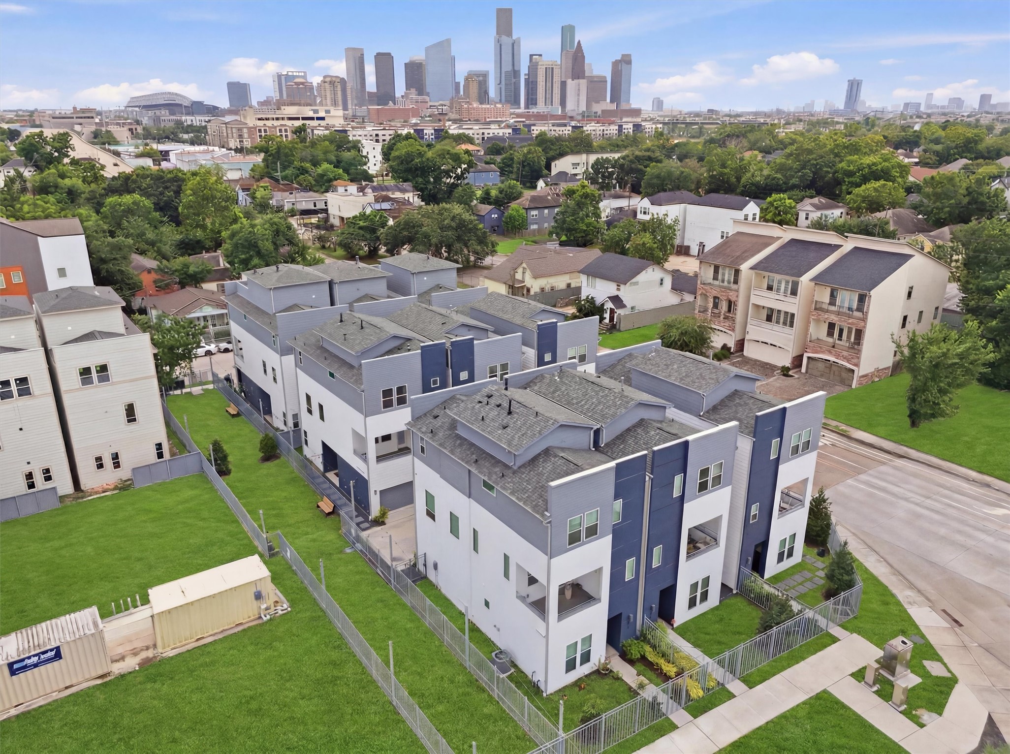 Modern townhomes in a vibrant neighborhood offer the perfect blend of urban living and serene surroundings, just moments from downtown Houston.