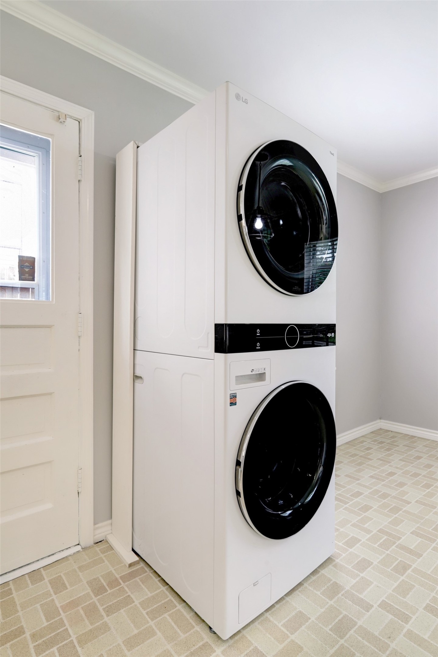 Full size washer and dryer enclosed with a cabinet, included.
